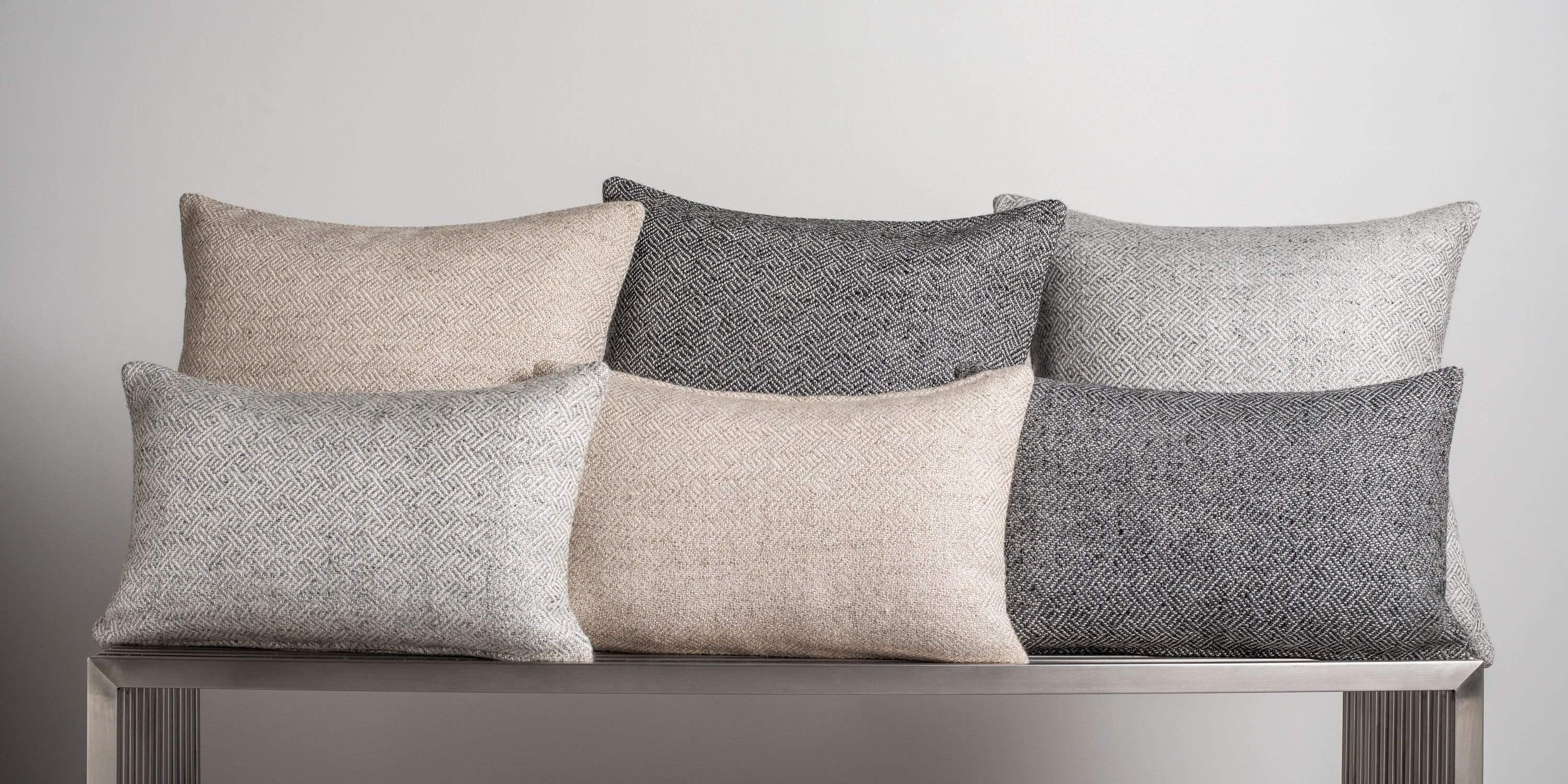 The perfect accent pillow, woven with a subtly modern angled diamond graphic is full of texture and depth creating contrast when paired with our sumptuous cashmere pillows. Pillow insert sold separately.

Size 22