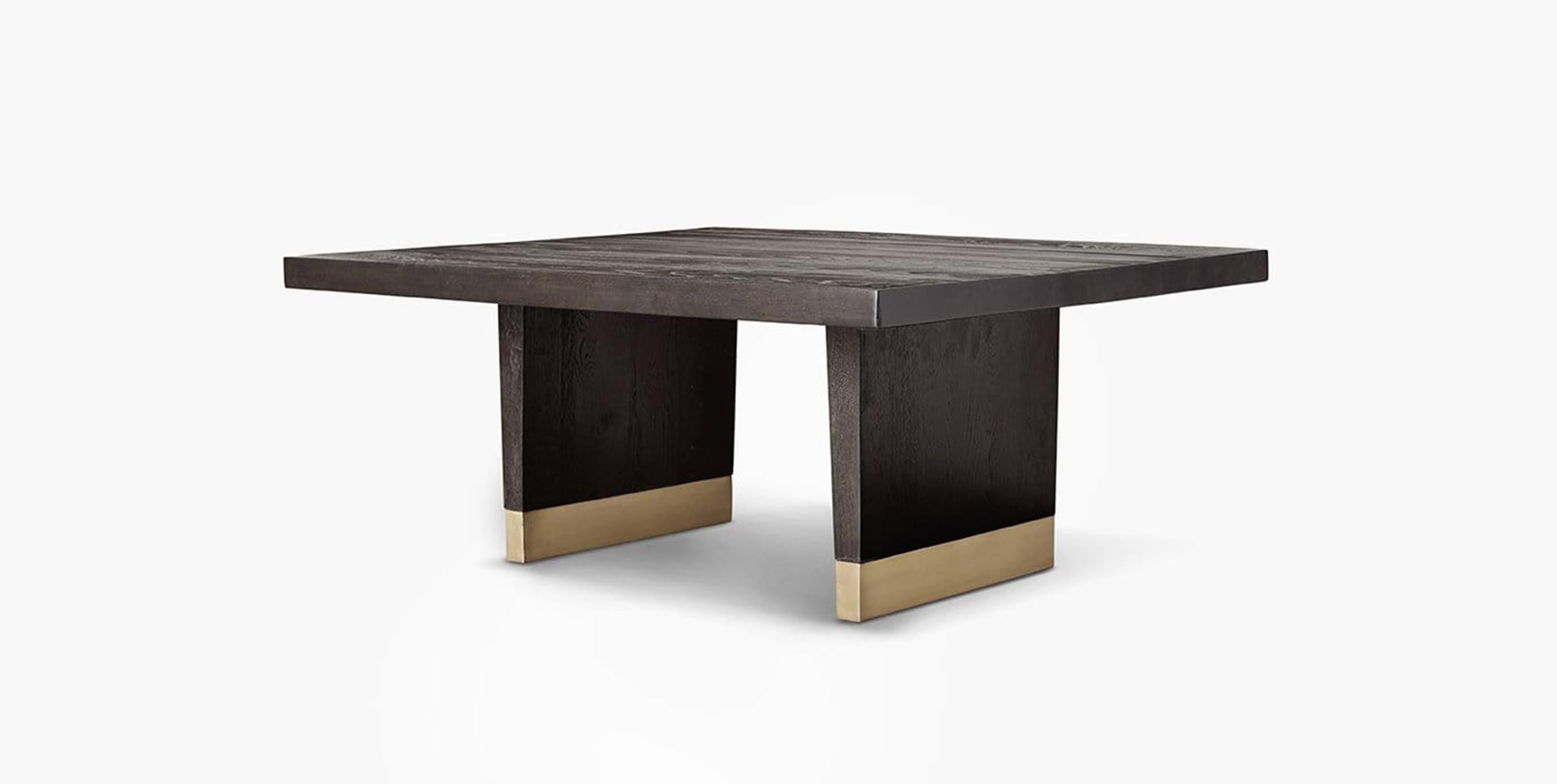Our Arche Coffee Table features a hardwood frame and paneled legs with a brass base for added texture and dimension for your living room. Our handcrafted finishes are inspired by variations within natural textures. Each selection is slightly unique.