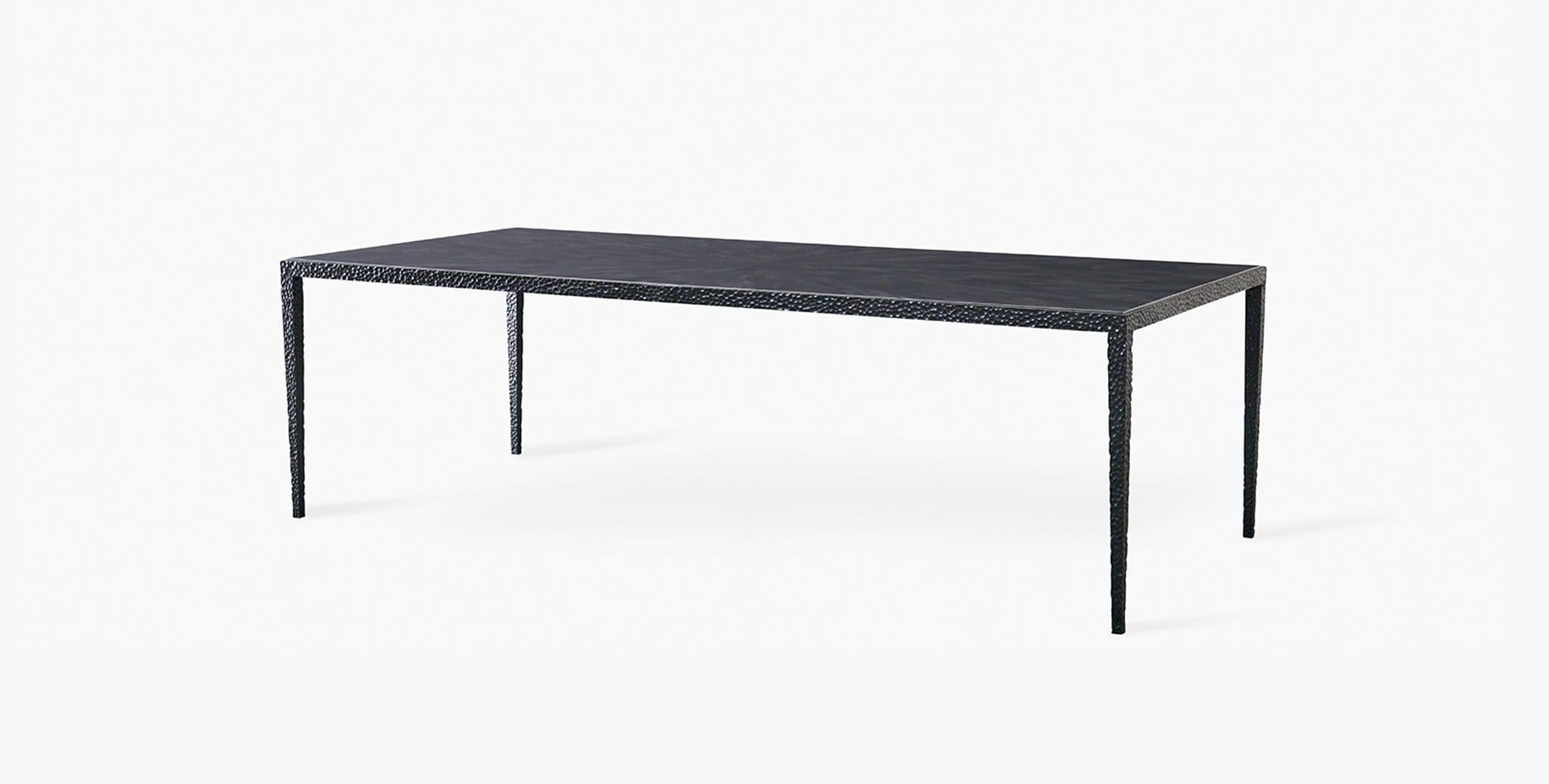 Our Aster Coffee Table creates a strong statement with its unique faux Horn tabletop and hammered black steel legs. Our handcrafted finishes are inspired by variations within natural textures. Each selection is slightly unique.

Faux Horn tabletop