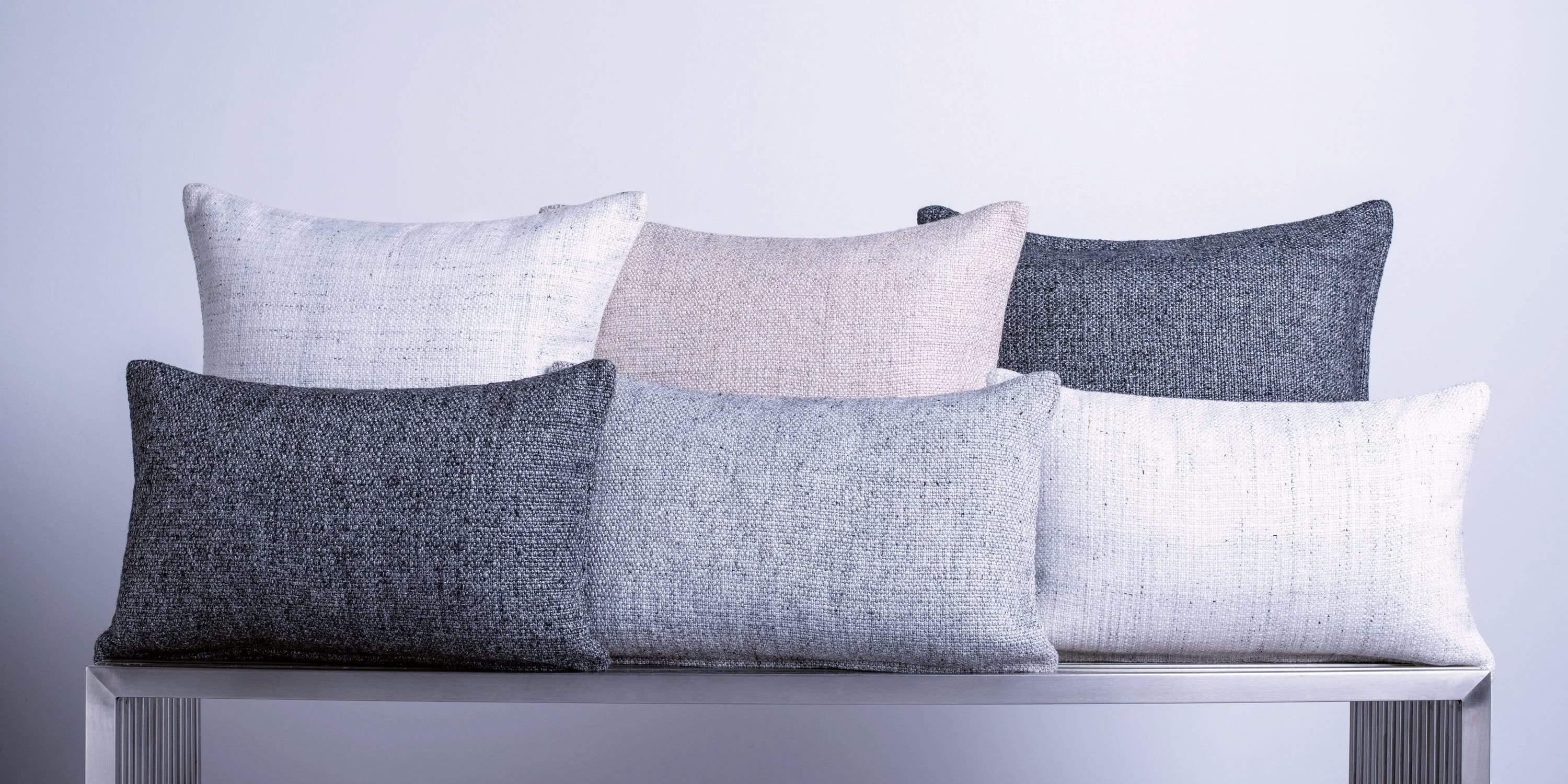 A finely woven nubby texture adds depth to your design. Subtly variegated tones, in a classic palette, add a touch of warmth to any room. Layer with our solid cashmere pillows for contrast. Pillow insert sold separately.

Size 13