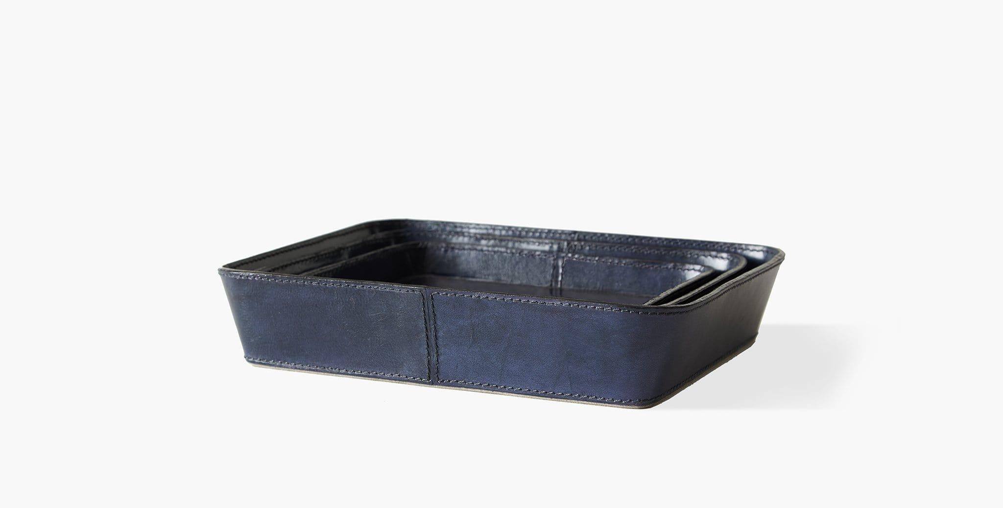 Our Bromes Leather Valet Trays feature a suede base for stability and provide a functional accent in your home office. Our handcrafted fabrics, leathers, and finishes are inspired by the natural variations within fibers, textures, and weaves. Each