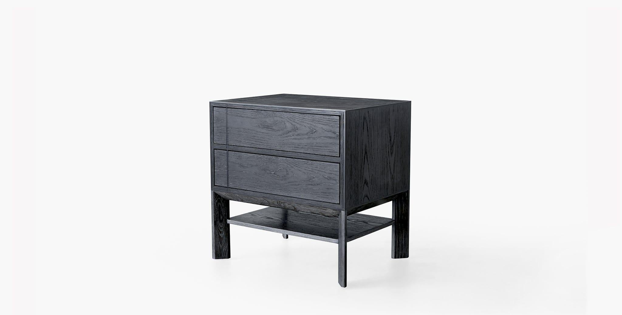 Our Burke Nightstand is thoughtfully simple in both form and function. Two drawers glide open with a single touch and the angled legs establish a subtle contemporary look. Our handcrafted finishes are inspired by variations within natural textures.