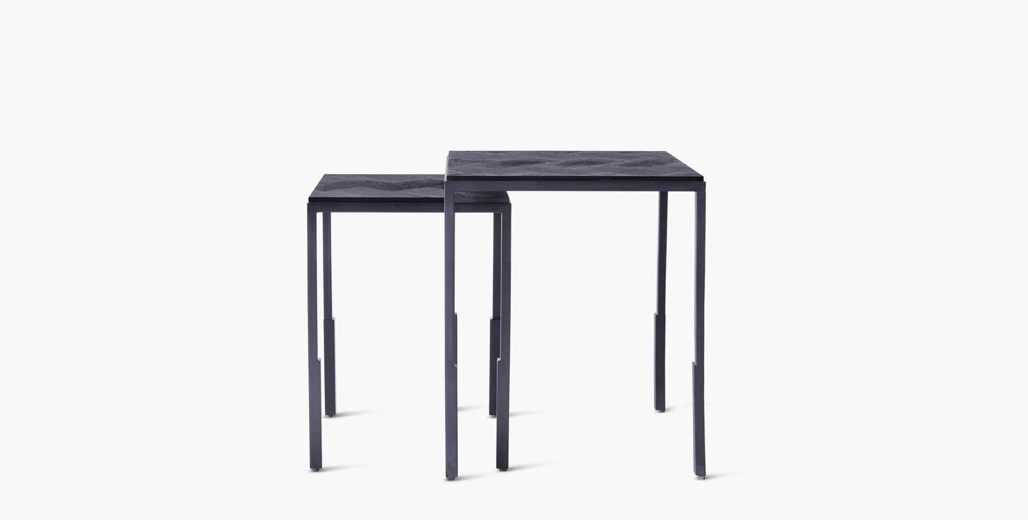 Our Cicely Table has an intriguing incised blackened wood top featuring a contemporary geometric pattern placed on a steel base. Our handcrafted finishes are inspired by variations within natural textures. Each selection is slightly unique.

Black