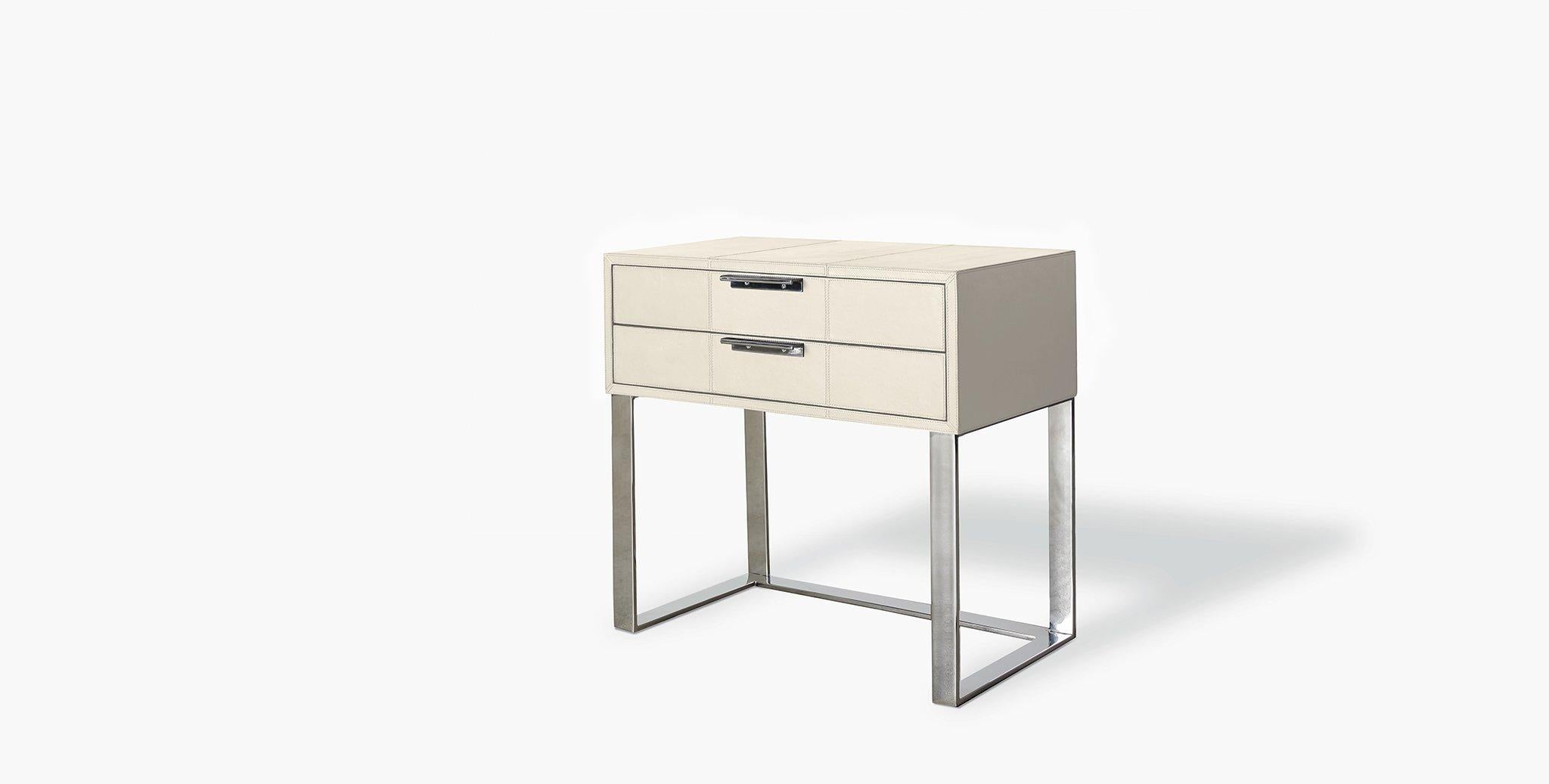 Our Holbrook Nightstand features two slender drawers accented with slim horizontal metal pulls and an open metal base for a clean and modern look. Our handcrafted leathers and finishes are inspired by the natural variations within fibers, textures,