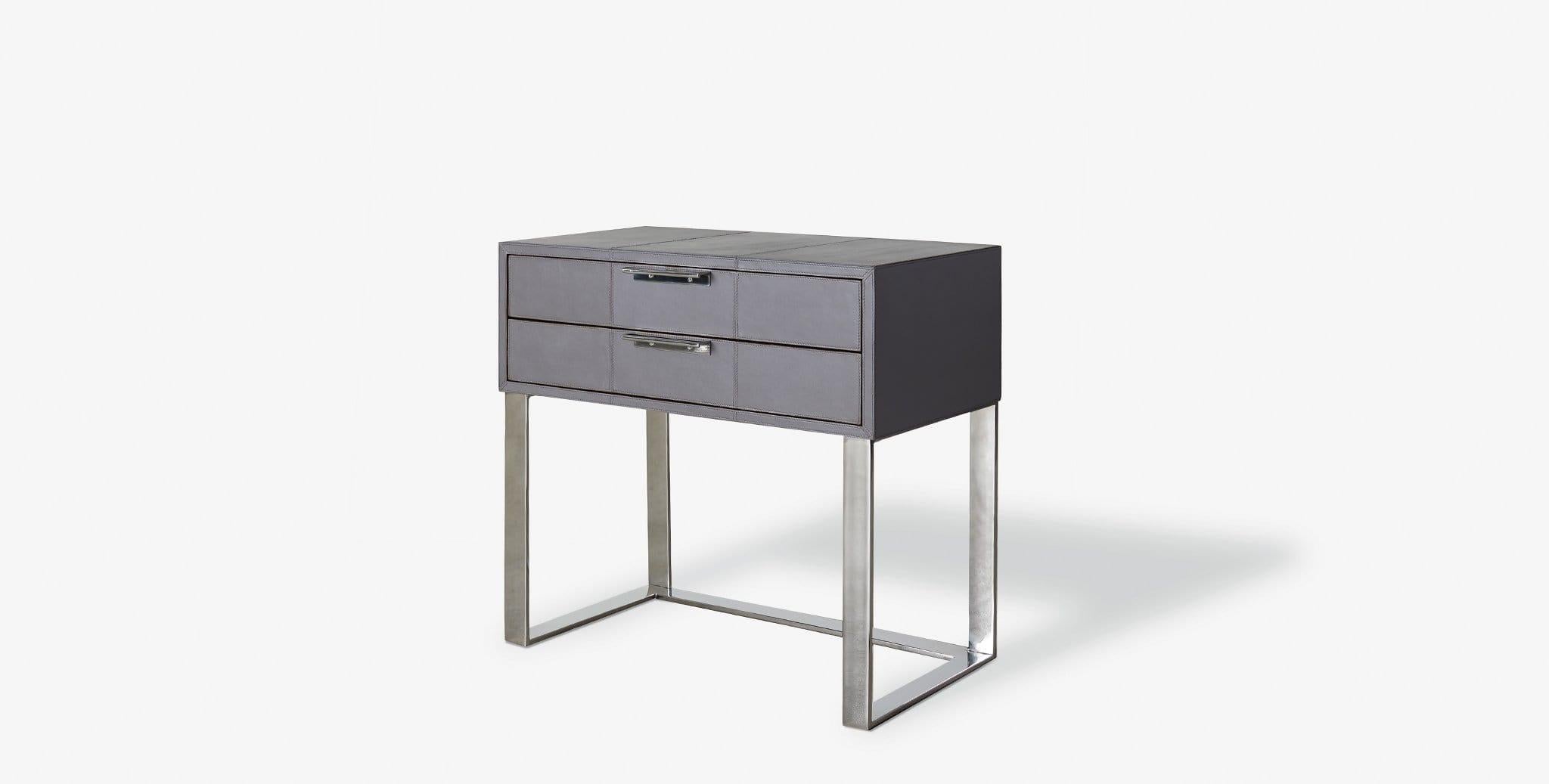 Our Holbrook Nightstand features two slender drawers accented with slim horizontal metal pulls and an open metal base for a clean and modern look. Our handcrafted leathers and finishes are inspired by the natural variations within fibers, textures,