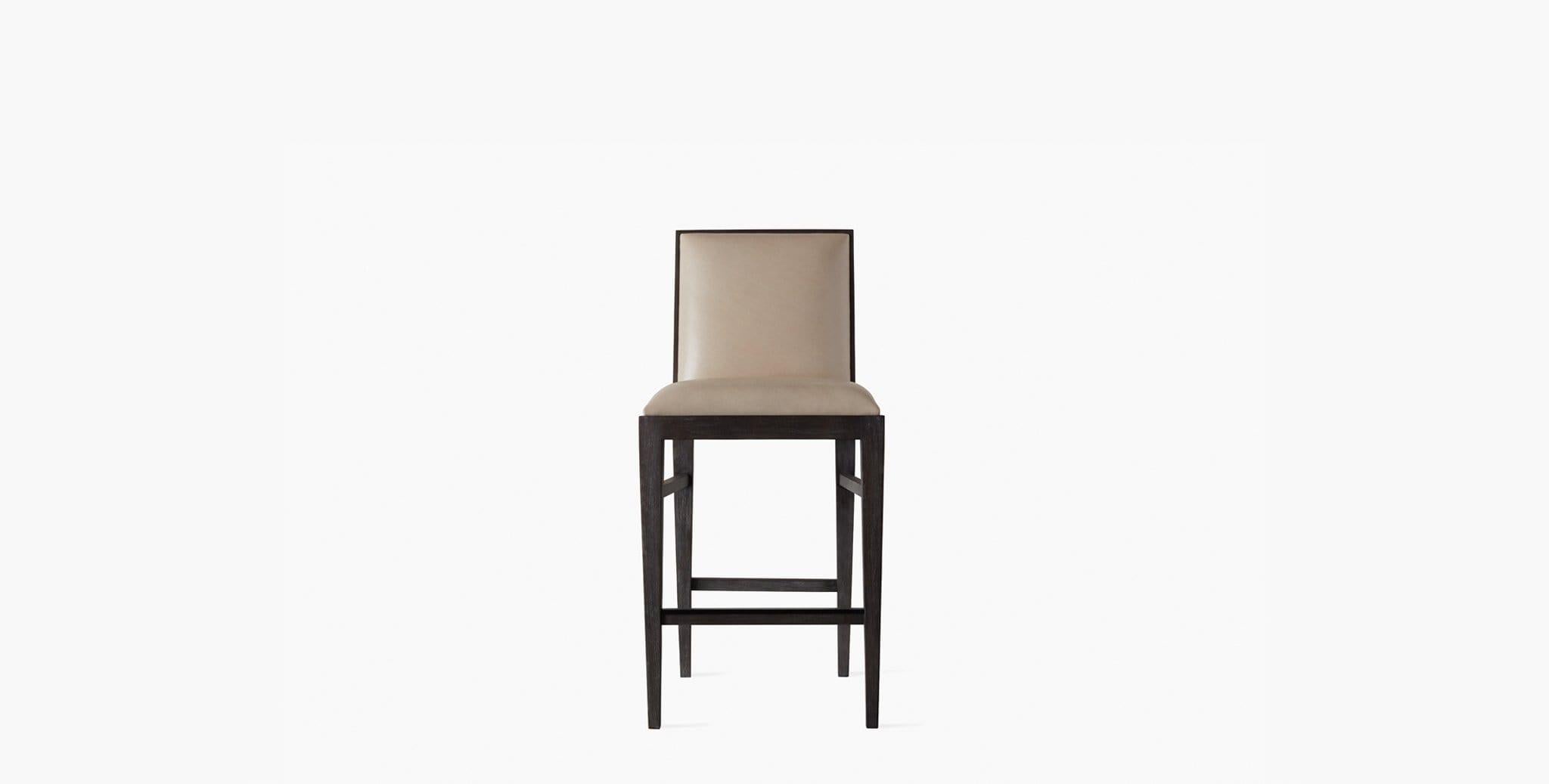 Our Landon Counter Stool has tailored upholstery in our signature leathers and velvet, along with weathered black oak tapered legs. Our handcrafted fabrics, leathers, and finishes are inspired by the natural variations within fibers, textures, and