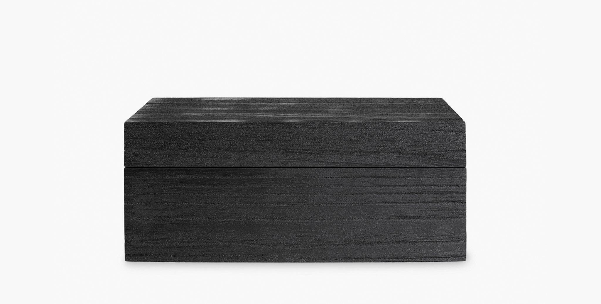 Our Monteserrat Paulowania hinged decorative boxes, are washed in a deep charcoal stain which allows the grain to be prominently highlighted, adding a subtle textural interest to your vignette. A sophisticated organizational option.

Available in