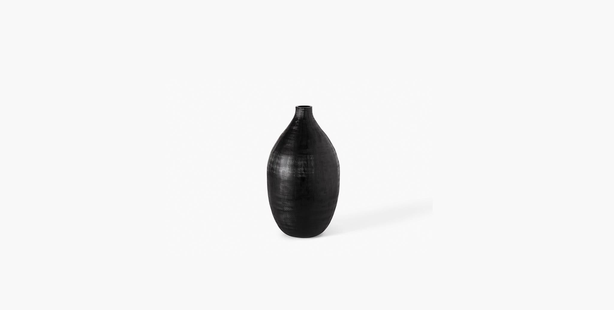 Our Rhea Vessel has a modern semi-opaque glass finish with a subtle crosshatch pattern that creates textural interest to your home design. Our handcrafted fabrics, leathers, and finishes are inspired by the natural variations within fibers,