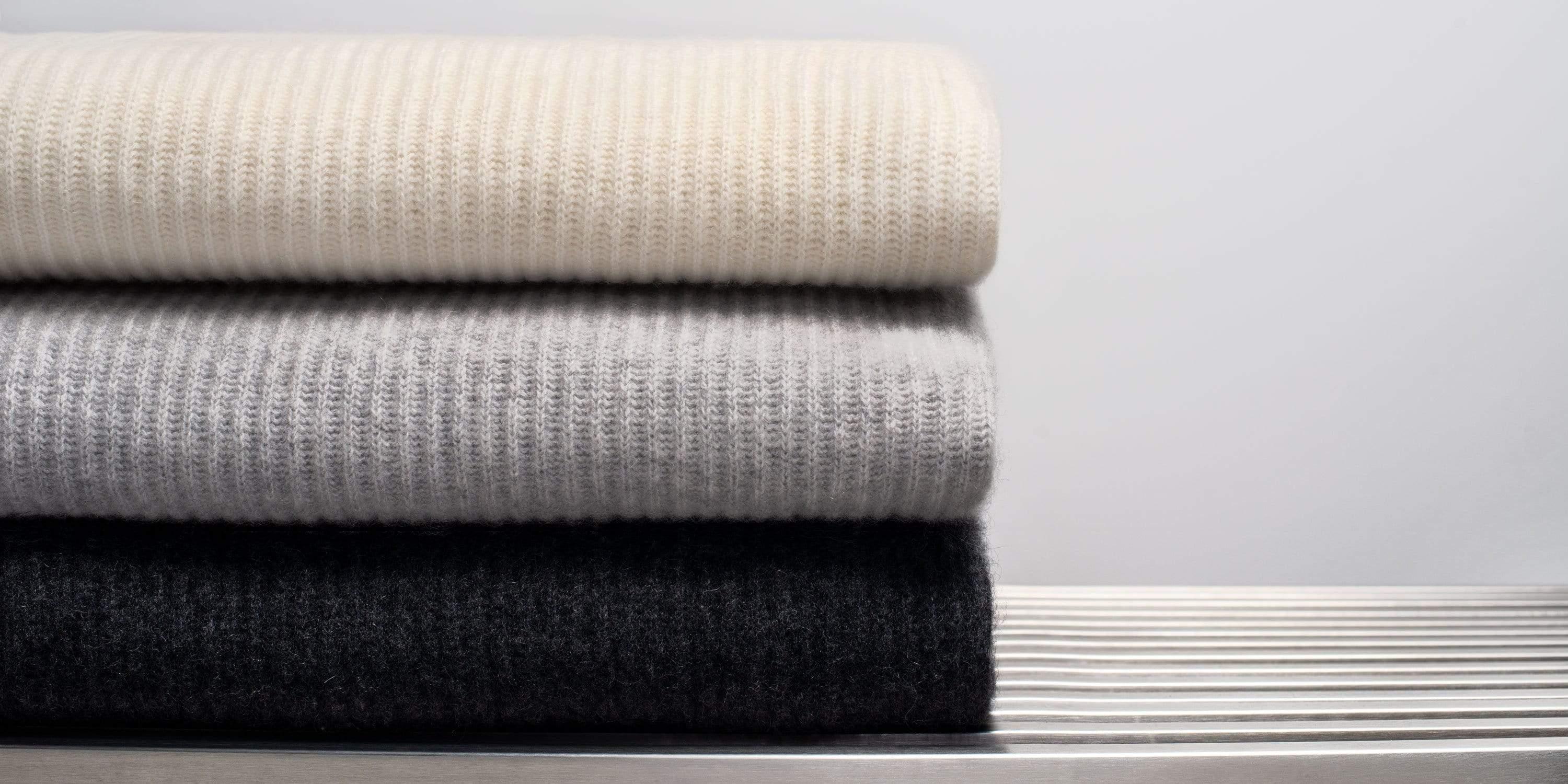 Our ribbed cashmere throw offers a modern take on a classic piece. Straight-edged finished, with raise ridged channels offer dimensional texture, creating an inviting accent to any room in your house. Generous scale perfect for end of bed. 

Size