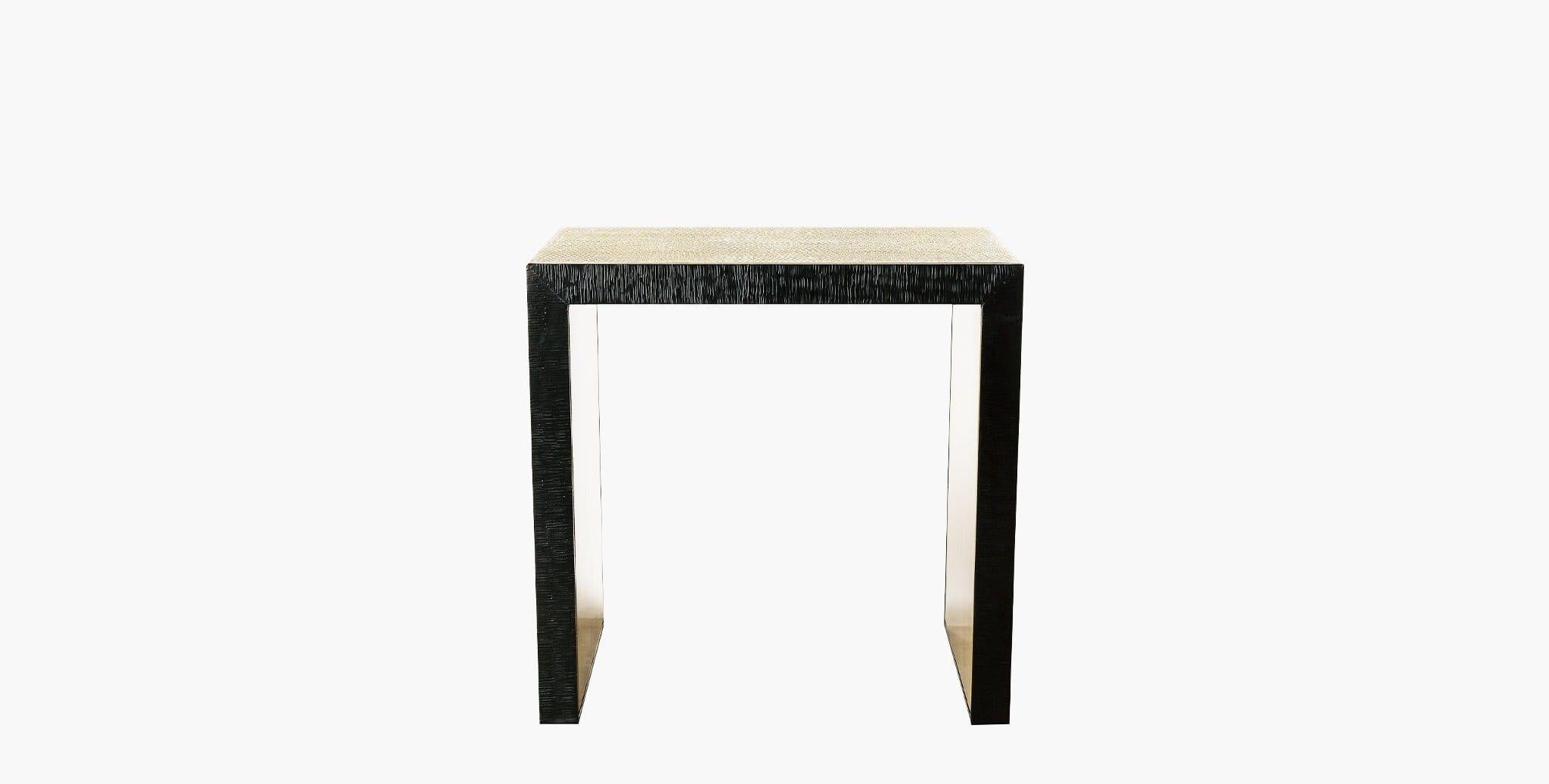 Our Roseau Side Table is a perfect statement piece to compliment your home, featuring a sleek waterfall silhouette of etched brass contrasted against the antiqued black steel. Our handcrafted finishes are inspired by variations within natural