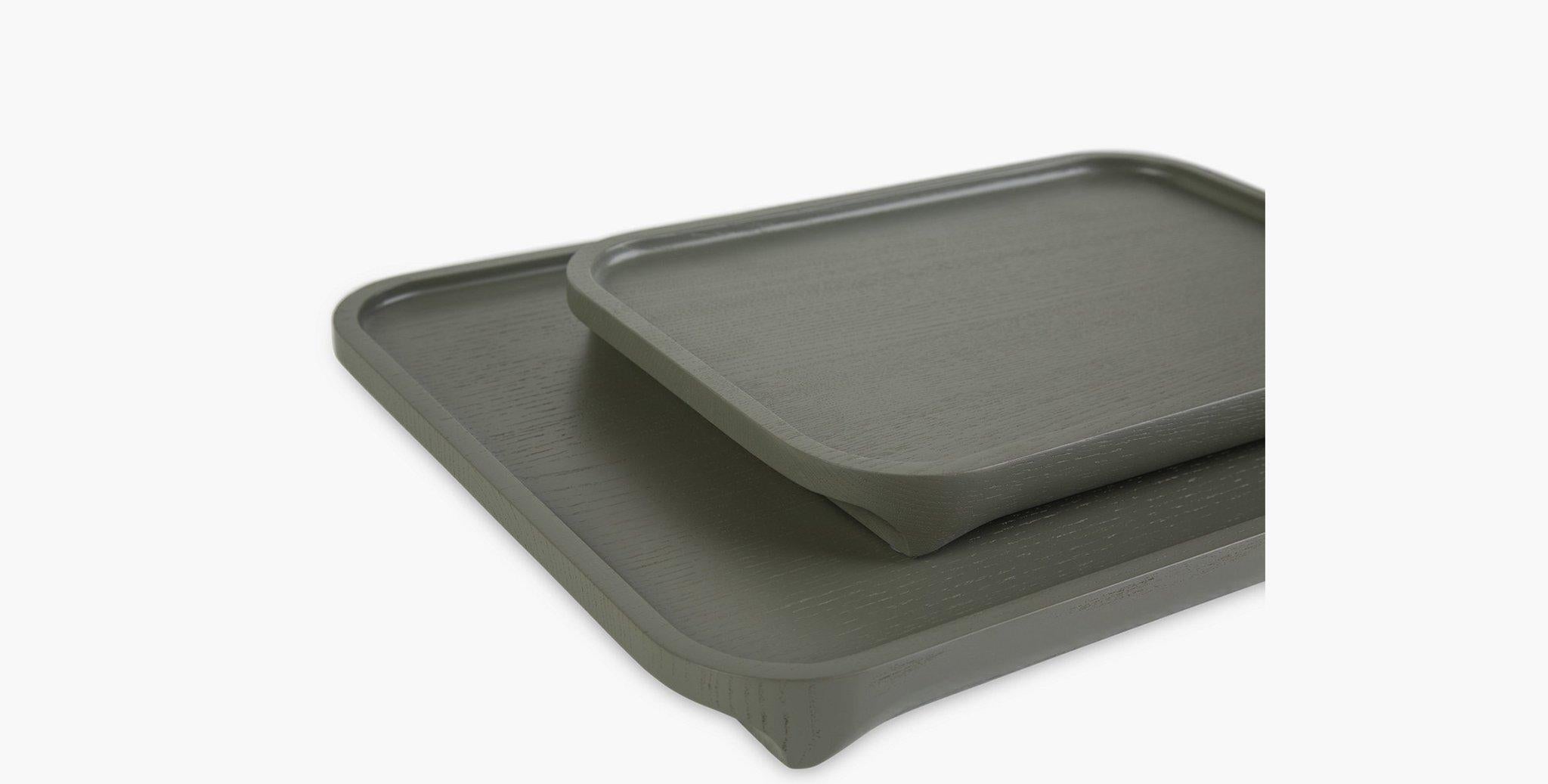 Our Santo Trays have a modern rounded edge, carved sloped feet and subtle lip. A matte green finish adds to this minimal Japanese inspired silhouette. 

Available in 2 sizes.