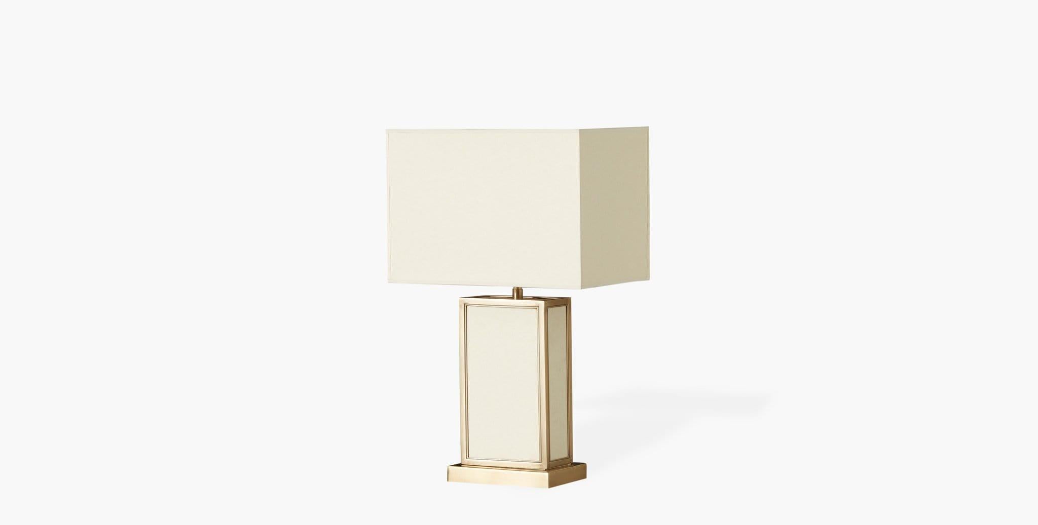 The Ivar Table Lamp radiates a soft, luminous glow that is balanced by the natural tones of its shade and base. Our handcrafted finishes are inspired by variations within natural textures. Each selection is slightly unique.

Parchment