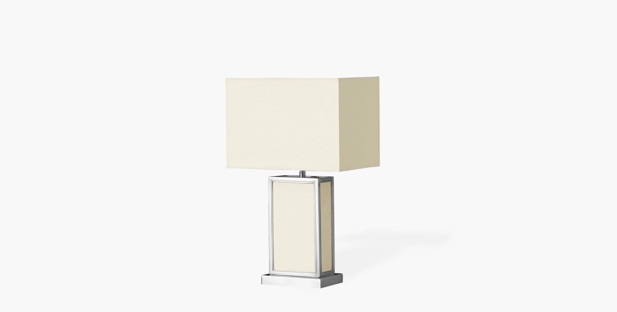 The Ivar Table Lamp radiates a soft, luminous glow that is balanced by the natural tones of its shade and base. Our handcrafted finishes are inspired by variations within natural textures. Each selection is slightly unique.

Parchment