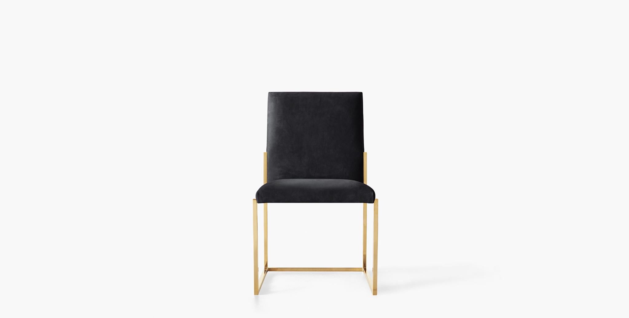 The wilder dining chair will elevate your dining room aesthetic. The sleek armless design upholstered in fine leather and geometric brass base exudes elegant glamour.
 