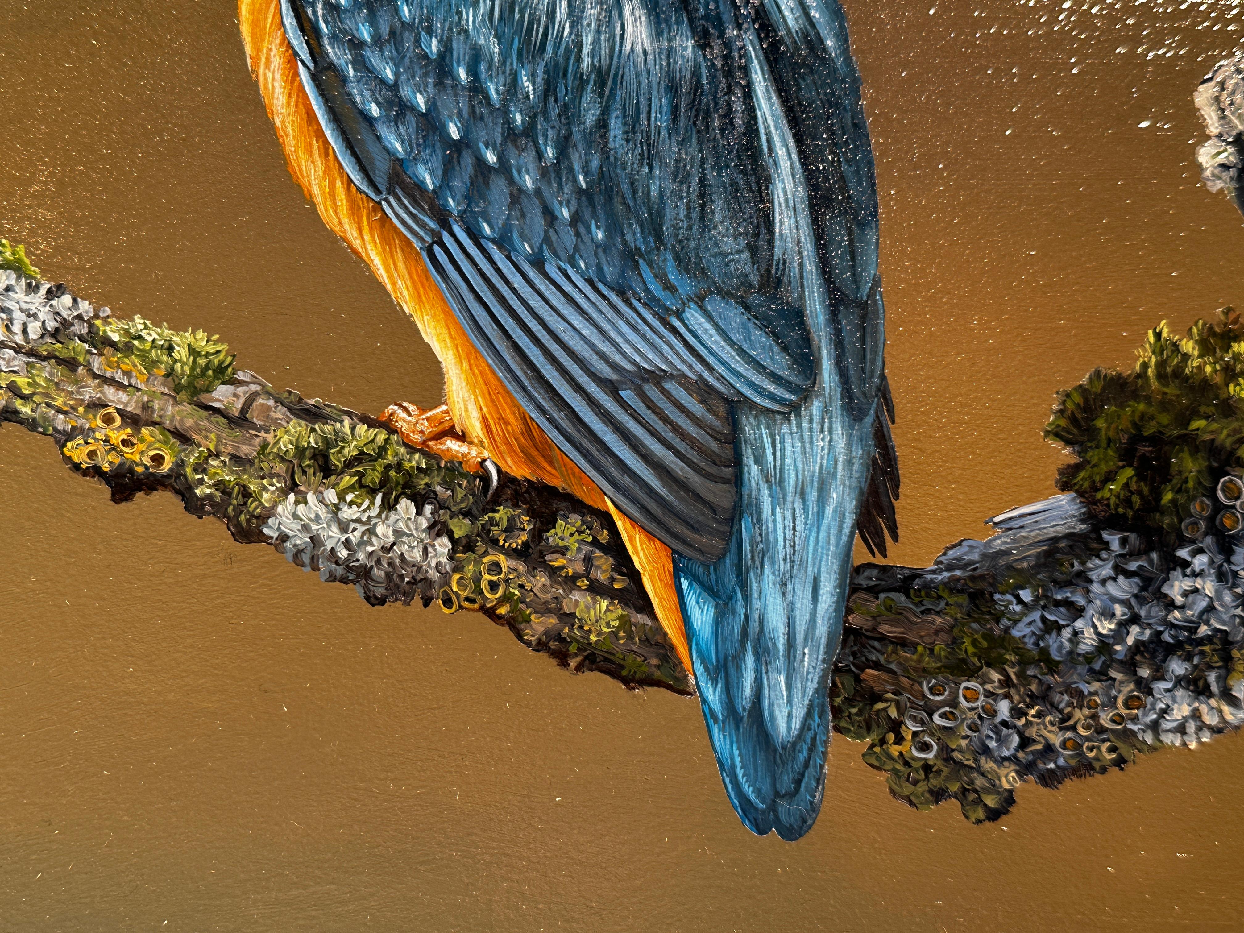 'A Moments Rest' by Ben Waddams is a Contemporary Realist Wildlife oil painting of a Kingfisher perched on a branch.  With such incredible detail you can almost feel feathers and expect the bird to dash and fly off. 

Ben Waddams is a British