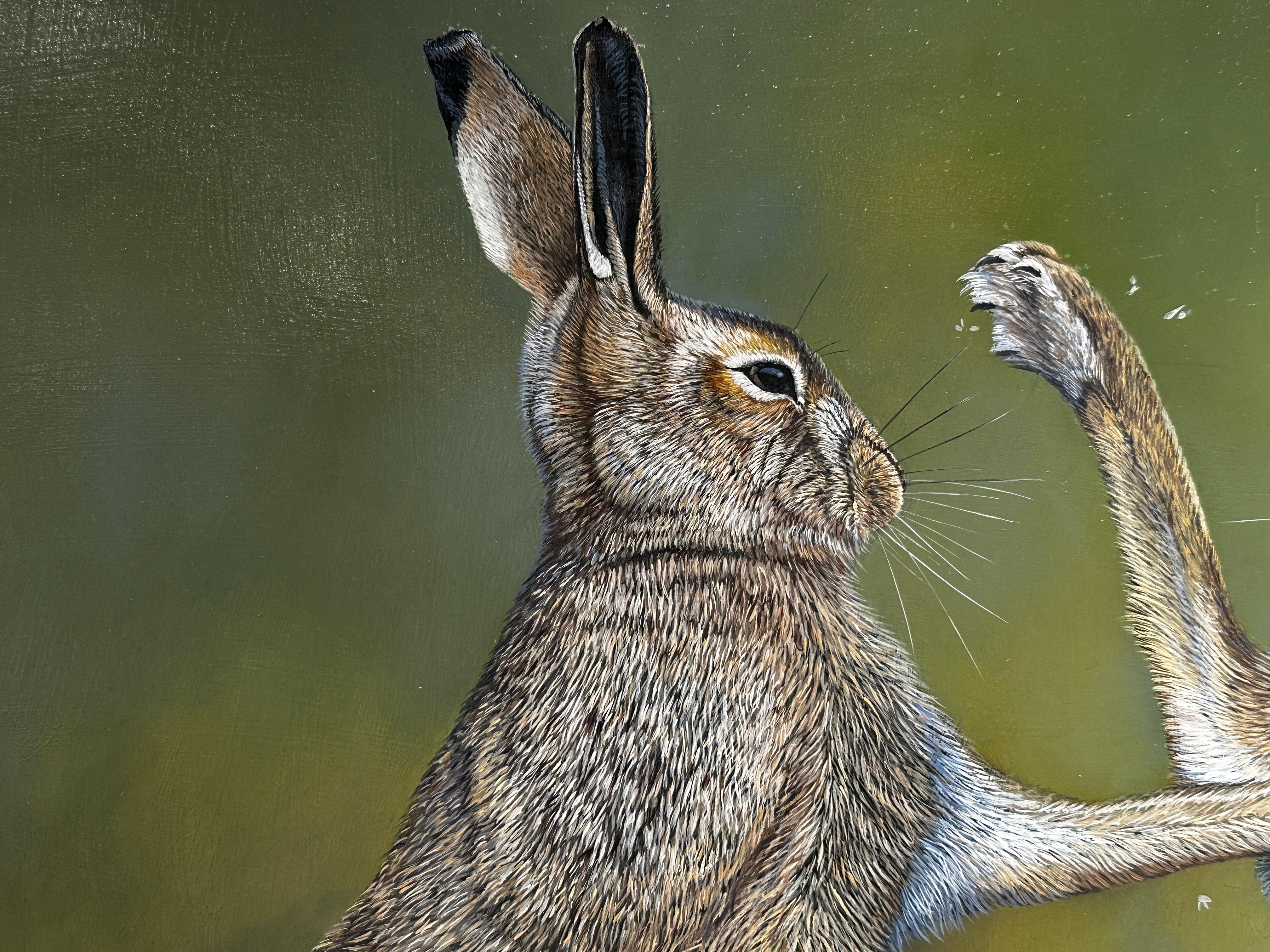 'MadMarch' by Ben Waddams is a Contemporary Realist Wildlife oil painting of a two boxing hares in the wild. 

Ben Waddams is a British wildlife artist living and working in Shropshire. Originally from Buckinghamshire, South East England, Ben has