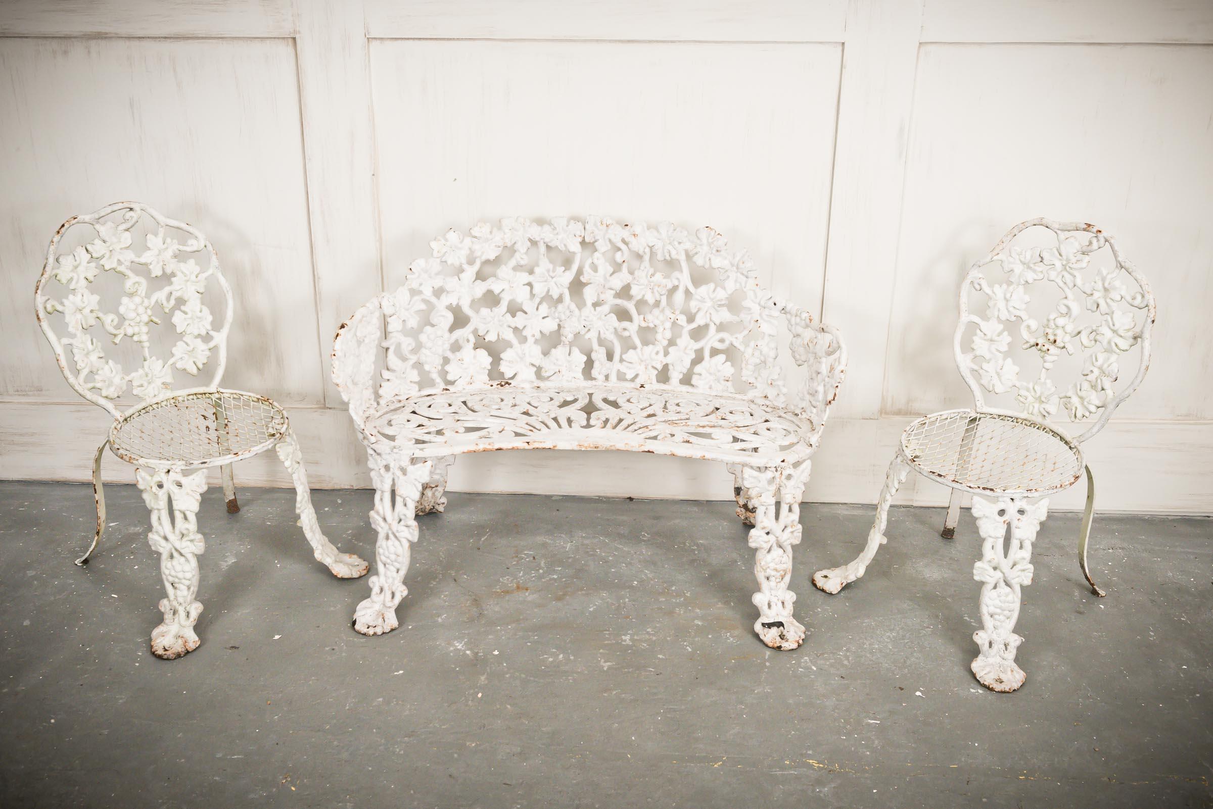 Beautiful duo of cast iron garden chairs with matching bench.
Please request exact measurements if needed.