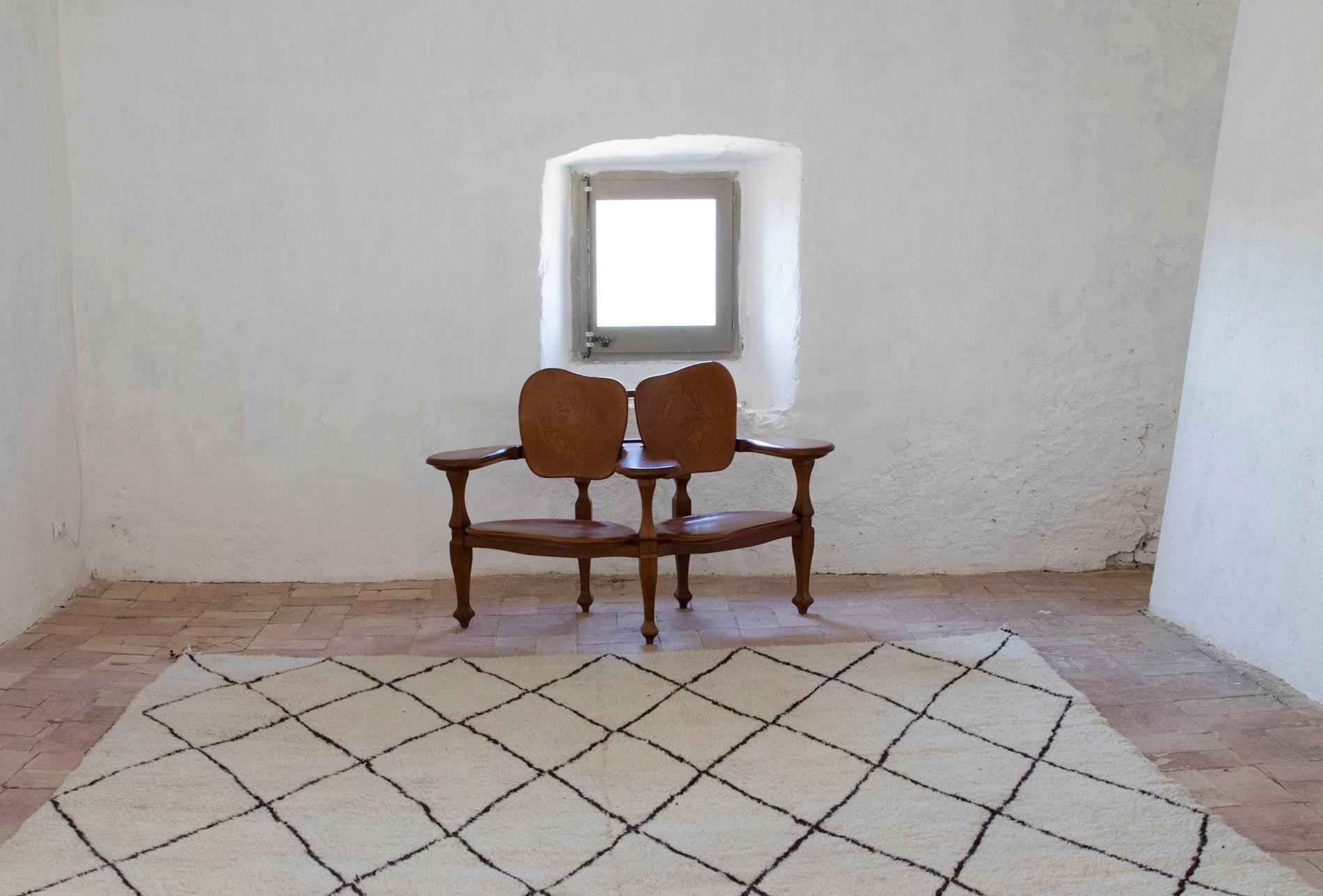 Bench designed by Antoni Gaudí for Casa Batlló.
Manufactured by BD Barcelona in 21st century, Spain.
Composed of several different parts fitted together. Its design, with a dividing armrest and two seats which face in different directions, gives