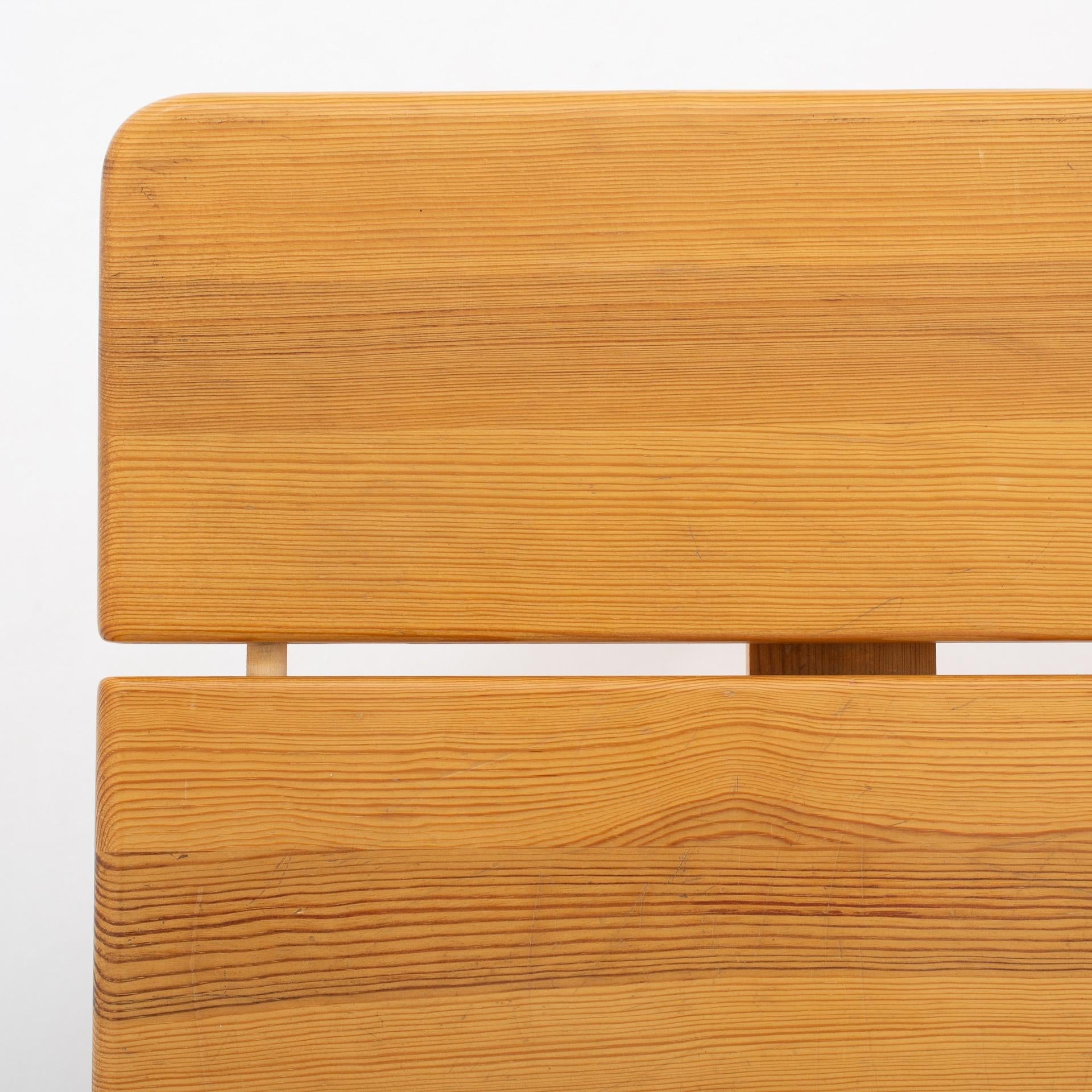 Bench in solid, lacquered pitch pine. Maker Karl Andersson.