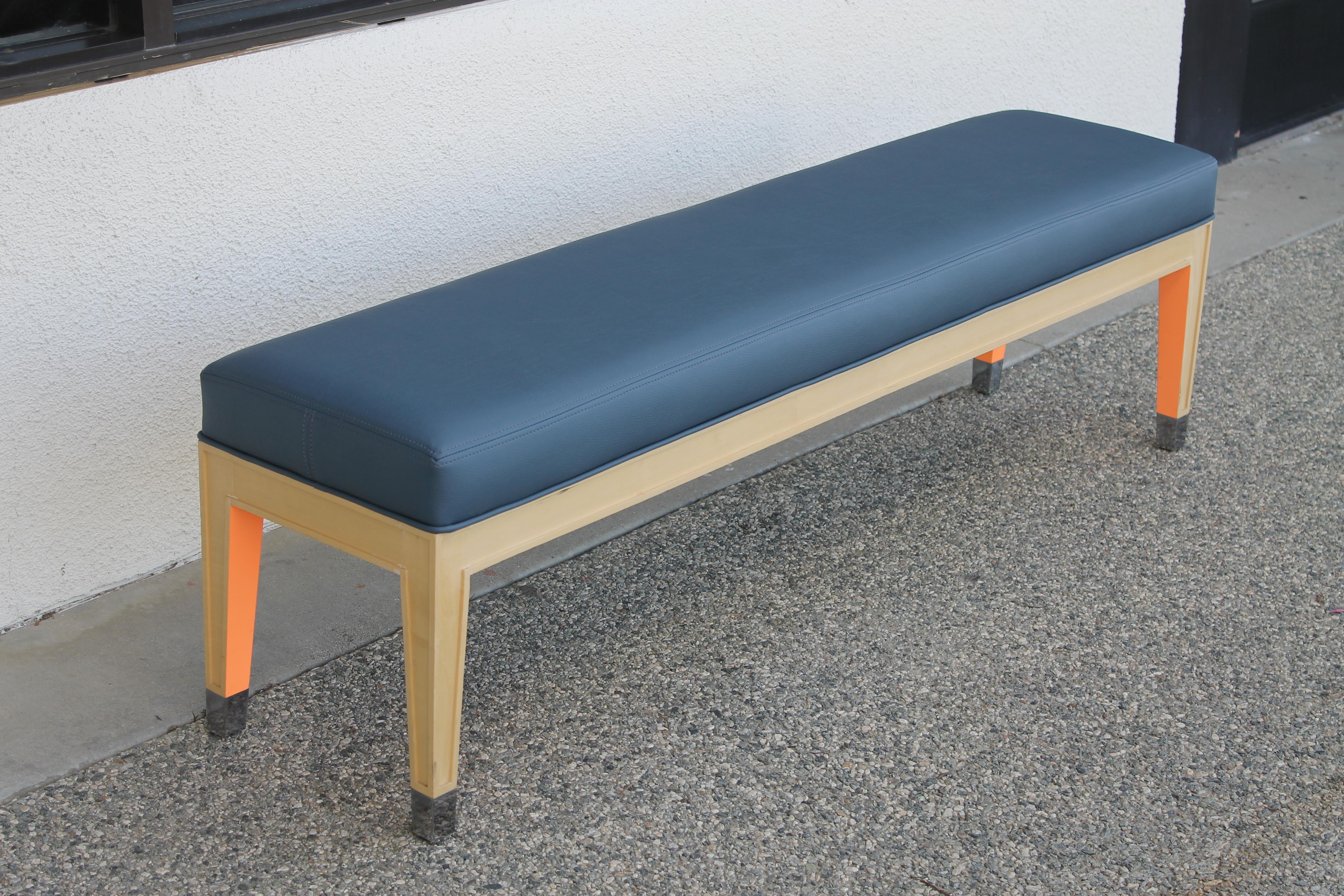 Bench designed by Philippe Starck for the Clift Royal Sonesta Hotel, San Francisco, CA., circa 2000. Bench has been professionally reupholstered in blue recycled leather. Bench measures 60