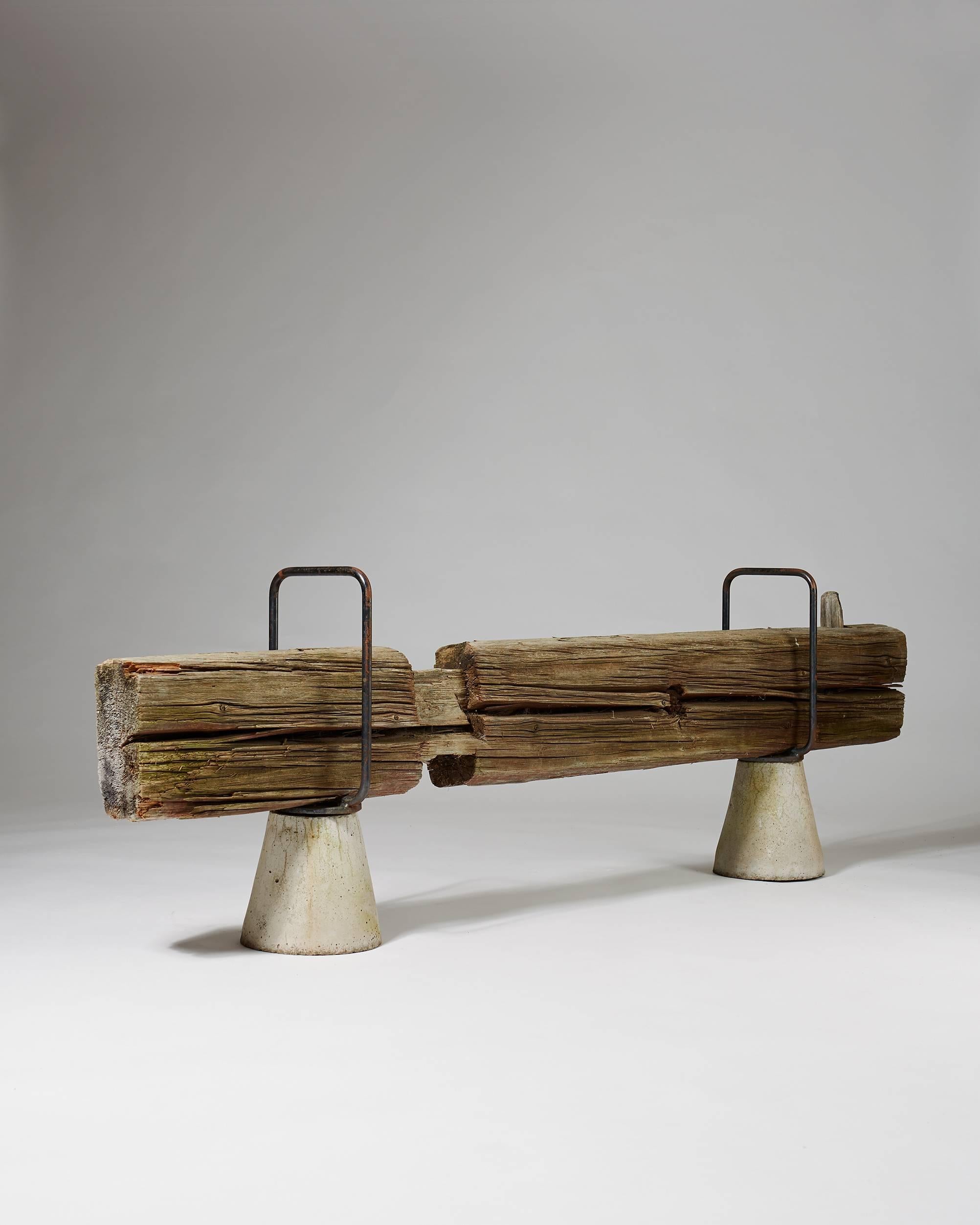 Bench designed by Jonas Bohlin for Arvesund, 
Sweden, 2016. 
Oak, iron and concrete.

 Meaures: H 67 cm/
 L 207 cm

 Created using old planks and beams from traditional barns.