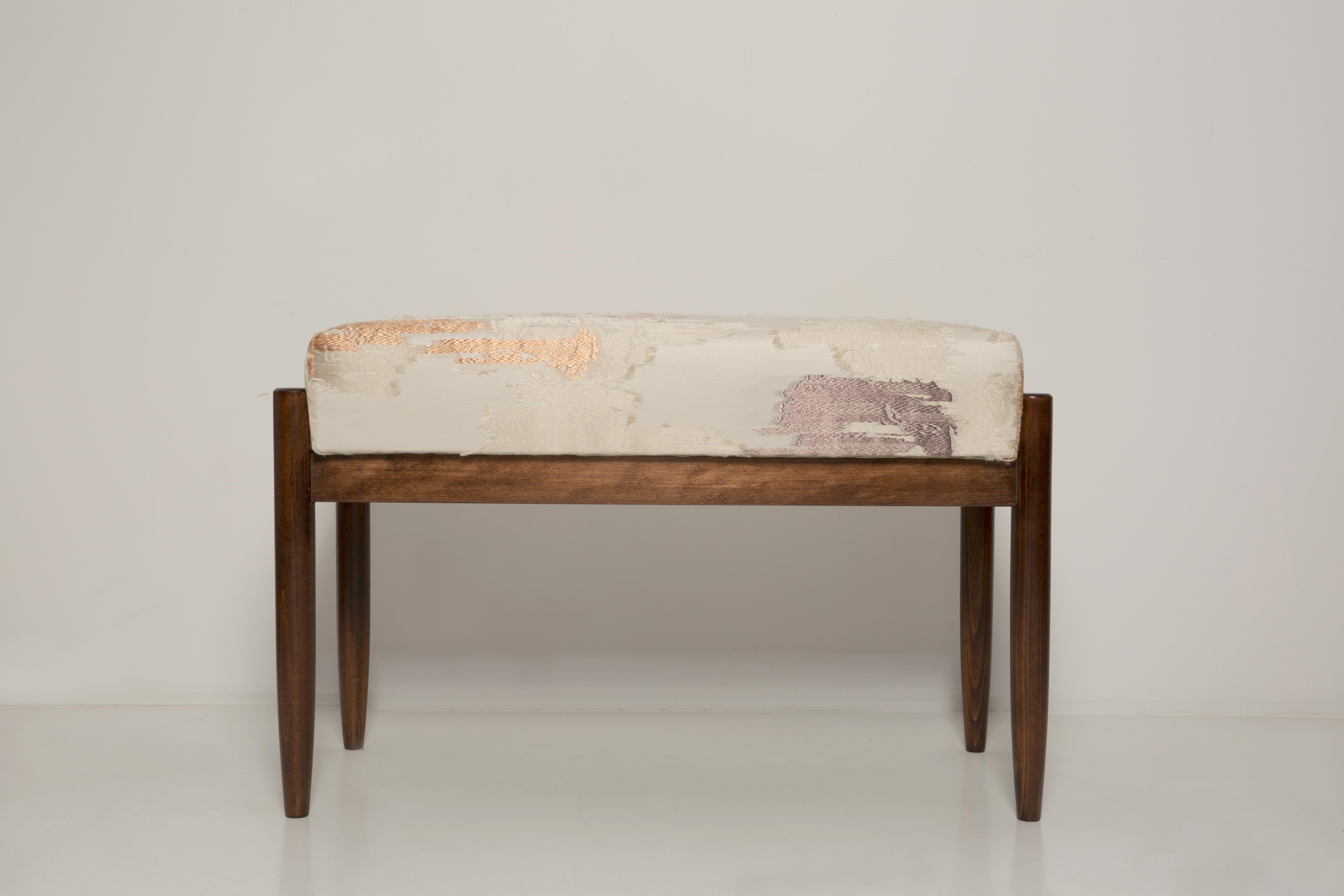 Contemporary Bench inspired of 1960s style. The bench consist of an upholstered part, a seat and wooden legs narrowing downwards, characteristic of the 1960s style.

Bench was designed by Vintola Studio, a Polish brand created by Ola Szewczul,