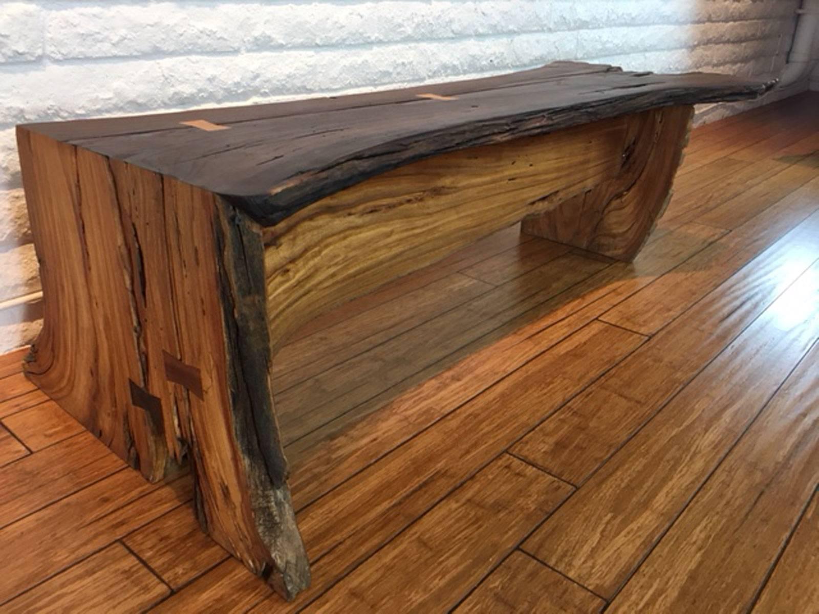 Long bench in pecan wood and inlay designed, produced and made by master wood artist and designer Scott Mills who only uses reclaimed (deadfall or storm downed trees) in the pieces he designs and produces. This piece is big, solid, eye-catching, and