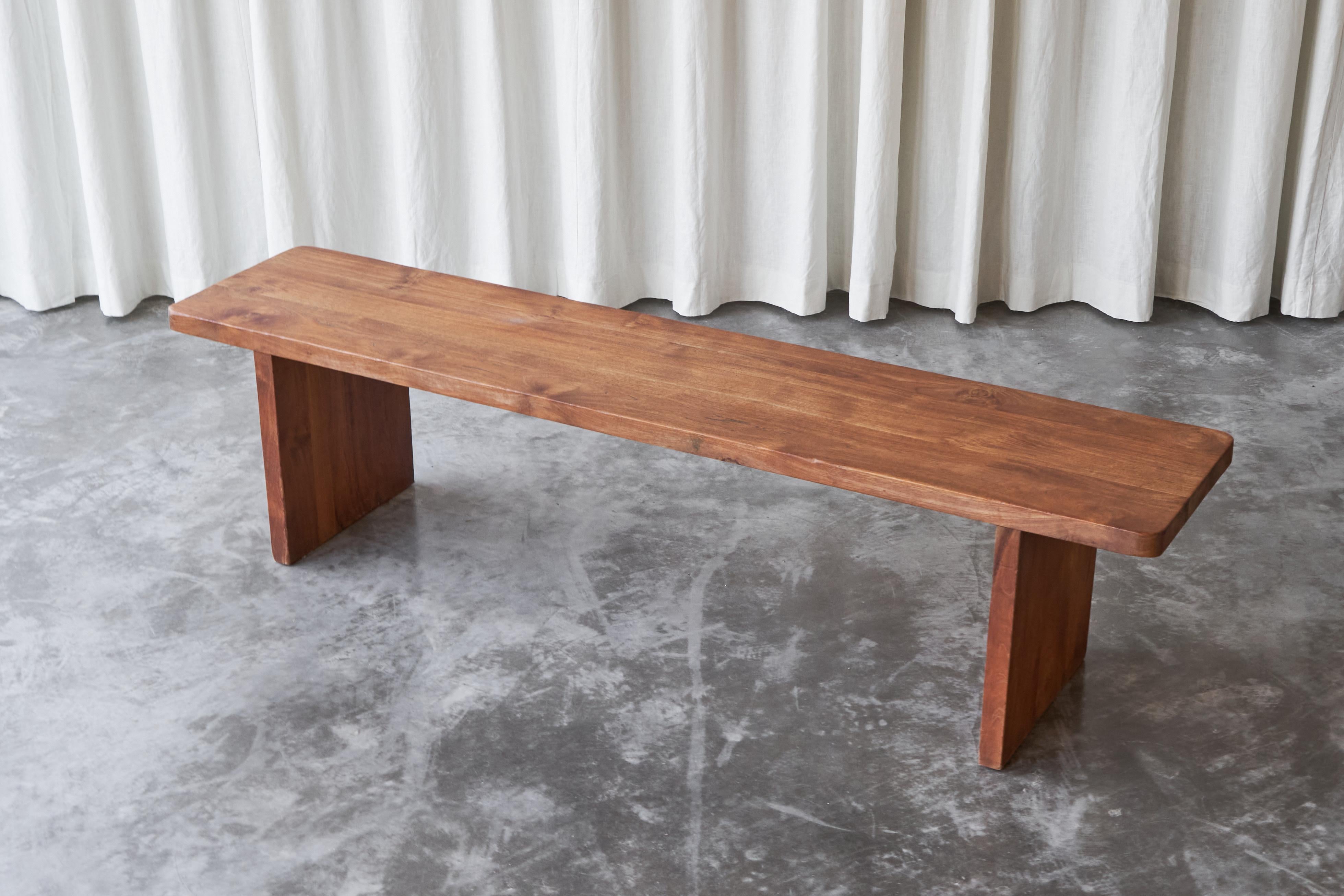 Bench in Solid Walnut, France, 1960s.

This unique mid century bench is well crafted in solid Walnut wood. It origins from France, 1960s and shows great similarity to the work of Pierre Chapo. Its design is basic, sturdy and sincere. The