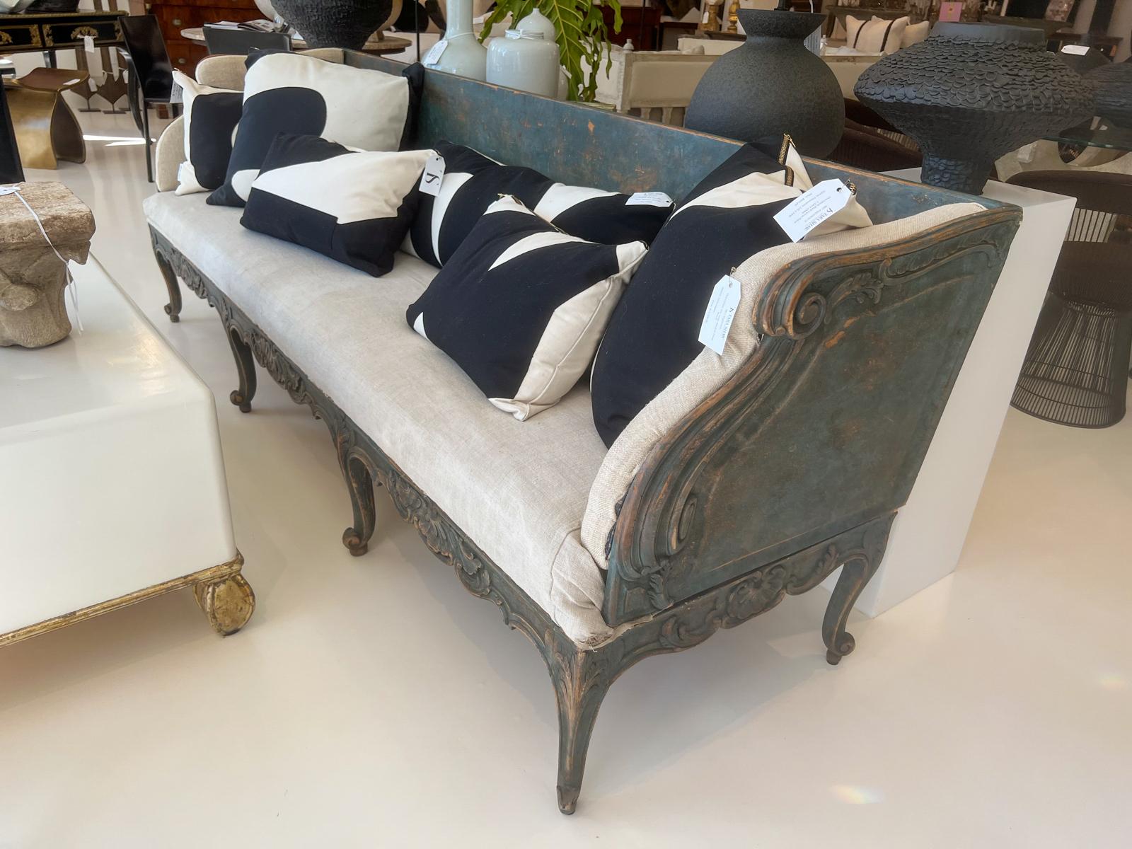 Long trag bench from Sweden. Beautiful finish in shades of blue, nicely distressed. Upholstered in flax linen.