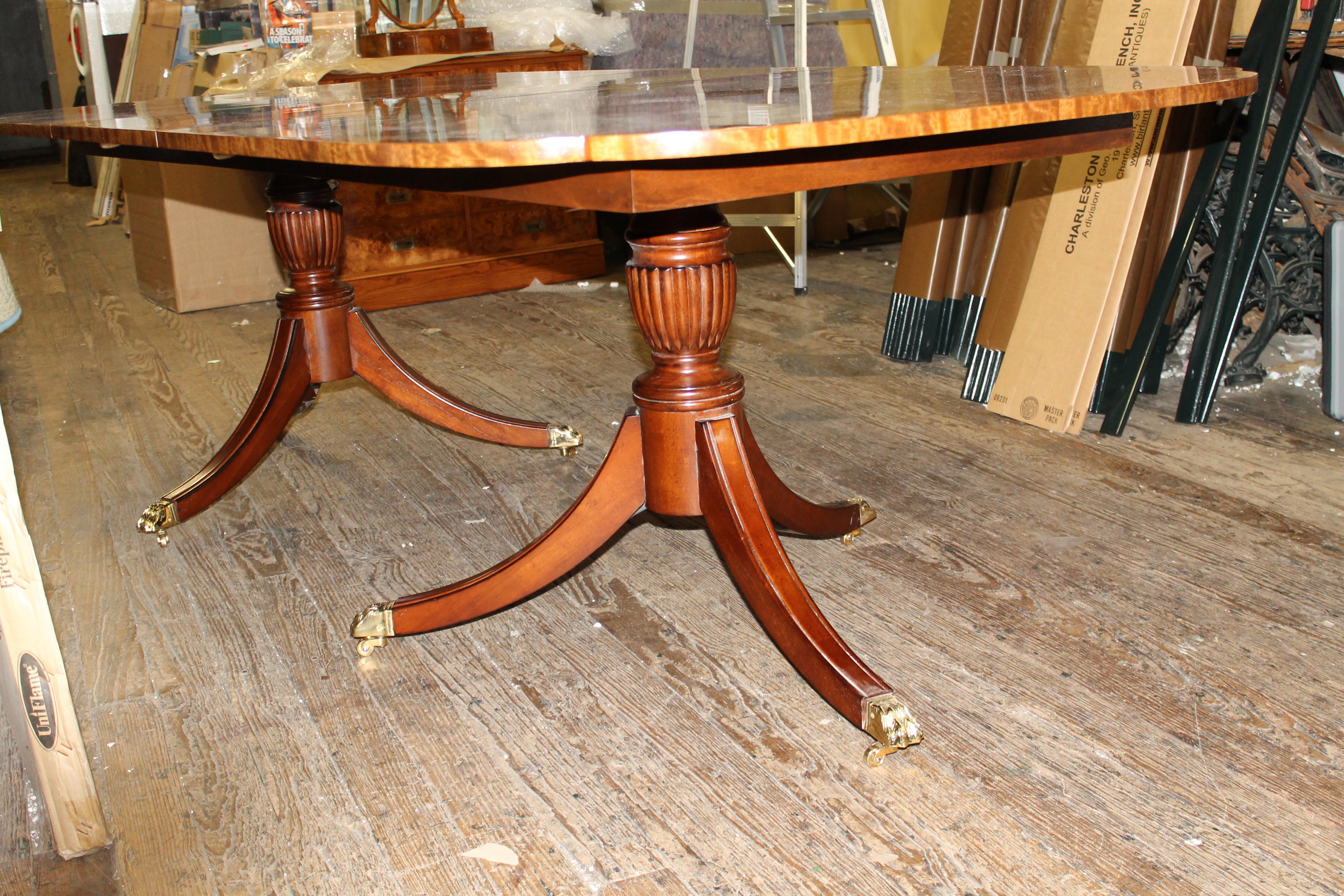 Contemporary Bench Made Reprod, Inlaid Flame Mahogany Sheraton Style Three Leaf Dining Table
