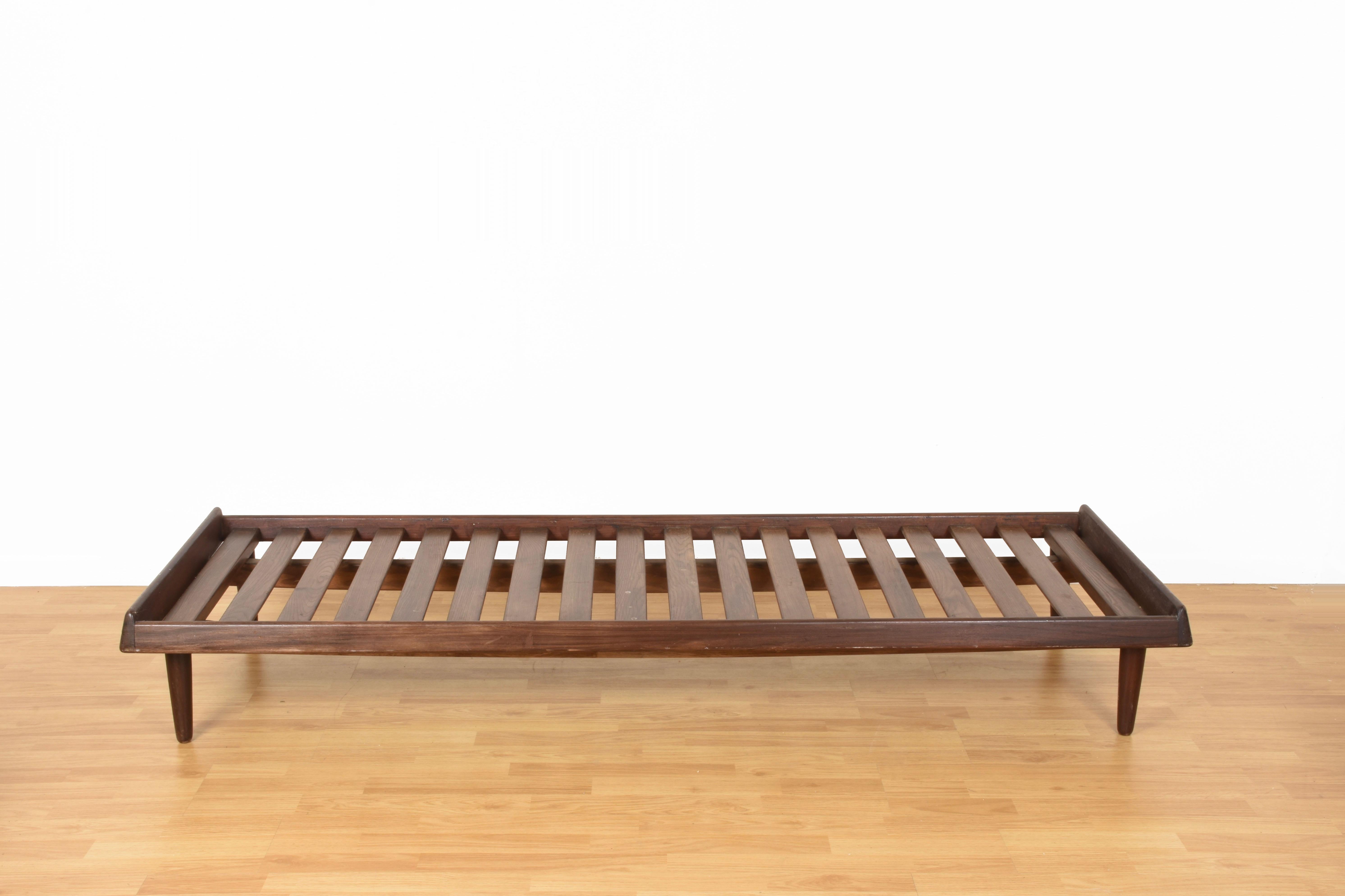 Fantastic sofa model TV161 designed by Hans Olsen, produced by Bramin, Denmark 1957. Made of solid teak. It can be used as a sofa or bench. Very beautiful and robust. 
Original condition.