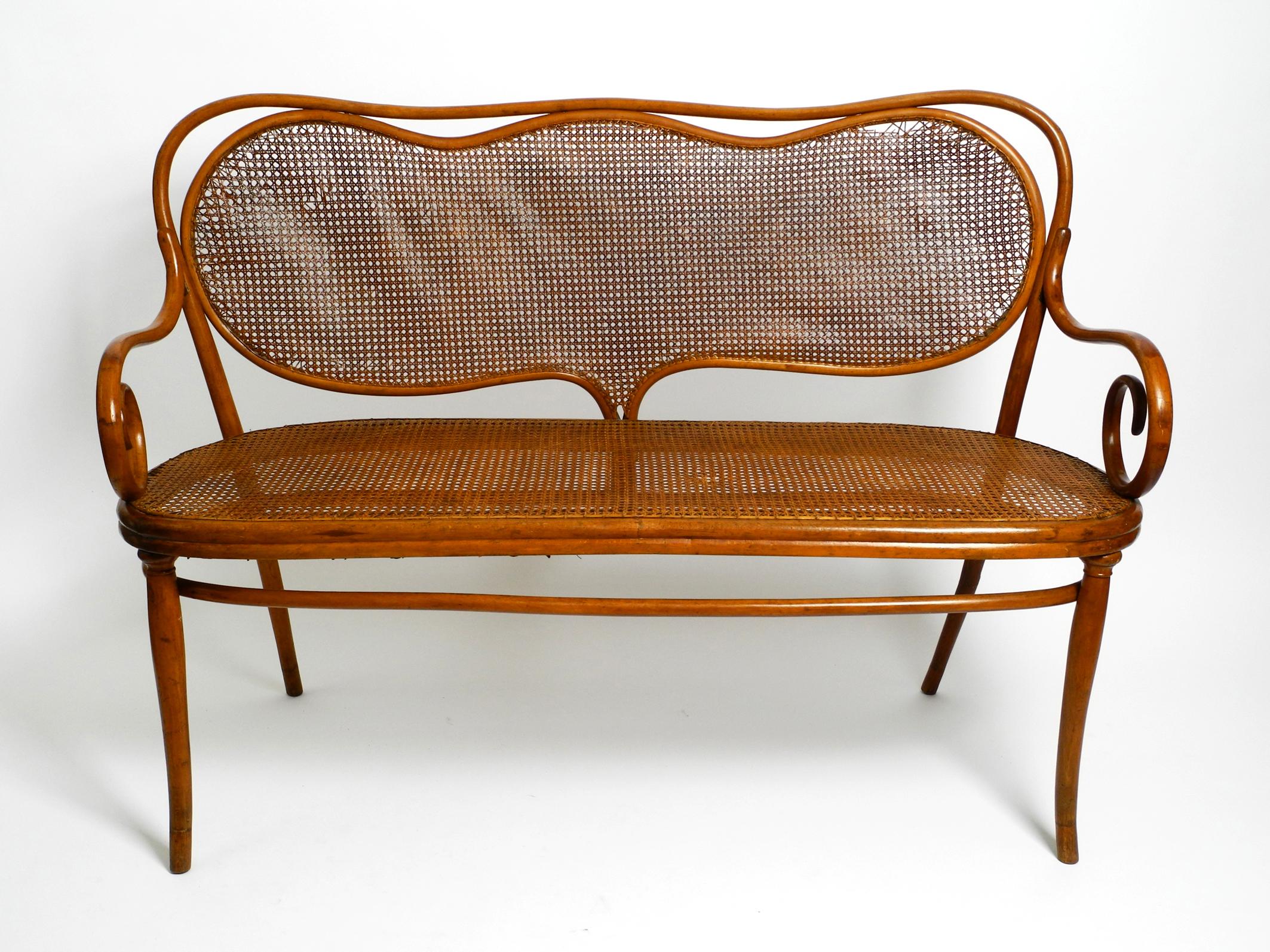 Beautiful, very rare original bench no. 5 by the Thonet brothers (Gebrüder Thonet) Vienna from 1859. Vienna Secession. Art Nouveau
With original branded logo and one original paper label on the bottom.
Made from bent beech with stripe glaze and