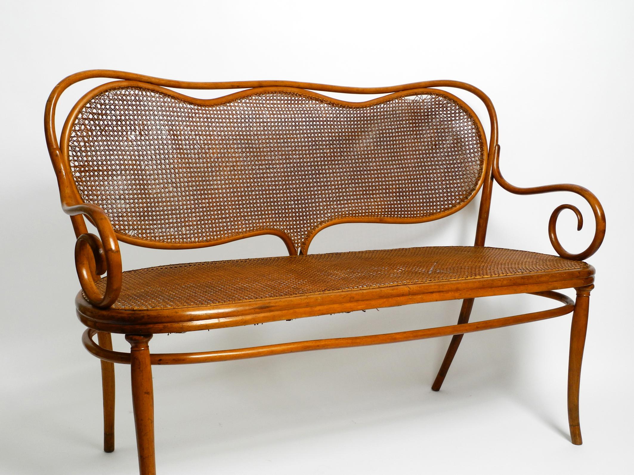 Austrian Bench No. 5 Thonet 1858 made of bent beech and wickerwork  restoration needed For Sale