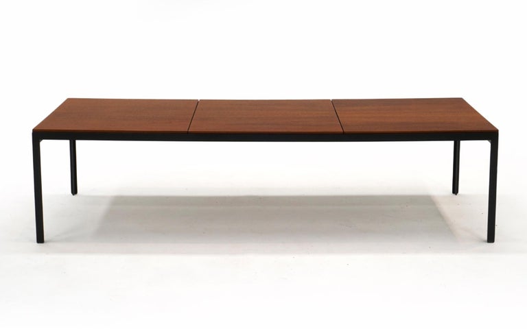 Florence Knoll architectural bench / coffee table. Three walnut panels on a black angle iron frame. Expertly refinished. No signs of use. Beautiful. 