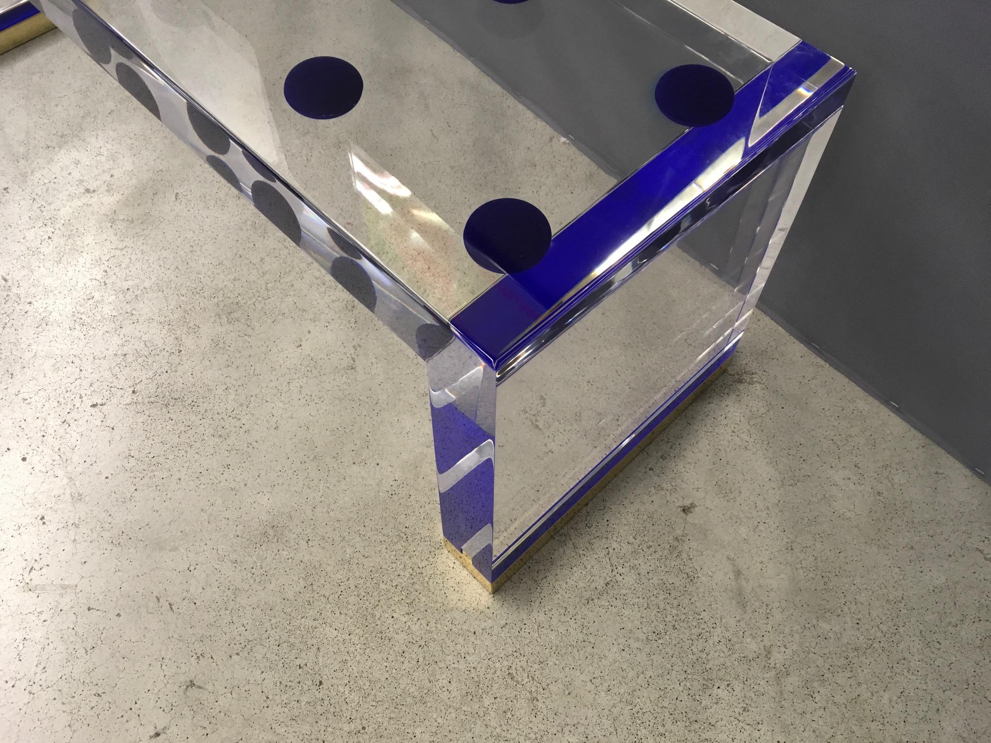 A beautiful bench or coffee table in transparent plexiglass with blue bubbles and brass plinths designed by Studio Superego for Superego Editions.

Biography
Superego editions was born in 2006, performing a constant activity of research in