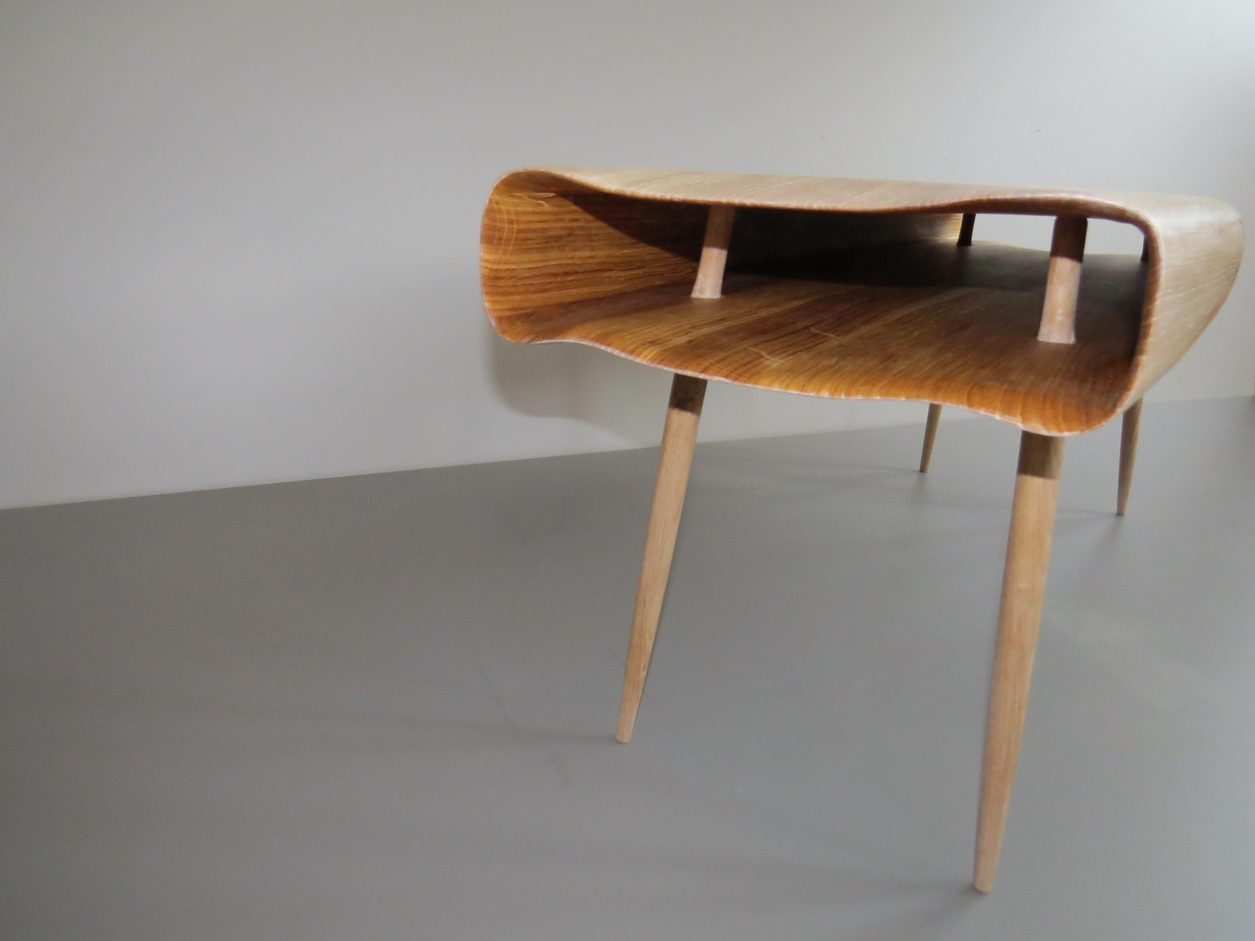 The furniture by the German furniture designer Eckehard Weimann seems to be alive.

Here as a bench: a hollow body made of solid wood serves as a seat object, it is organically delicately worked out -
by hand, of course!
The object appears soft in
