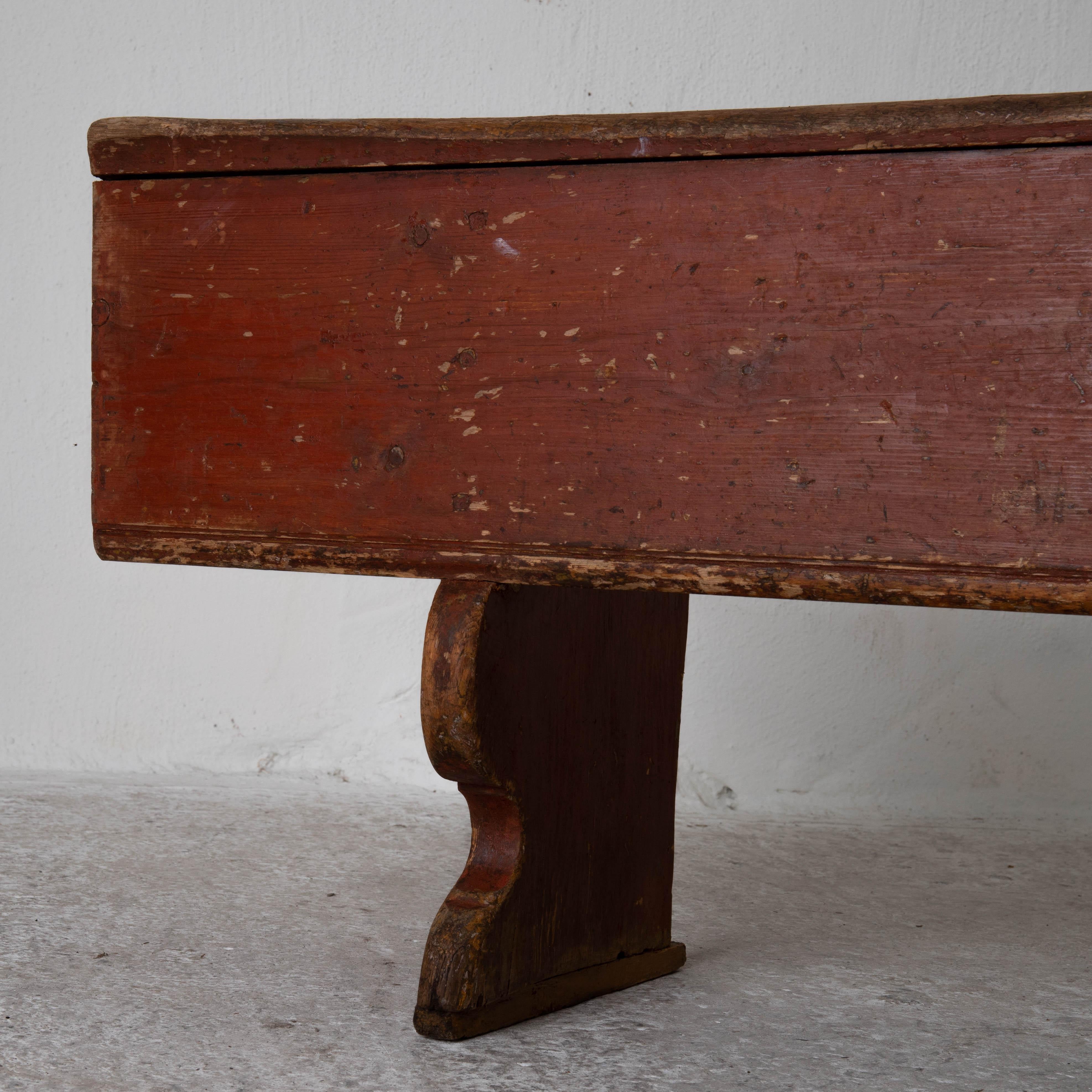 Bench Swedish red wood, 19th century, Sweden. A bench made during the early 19th century in Sweden. Original paint in a dark red shade.

   