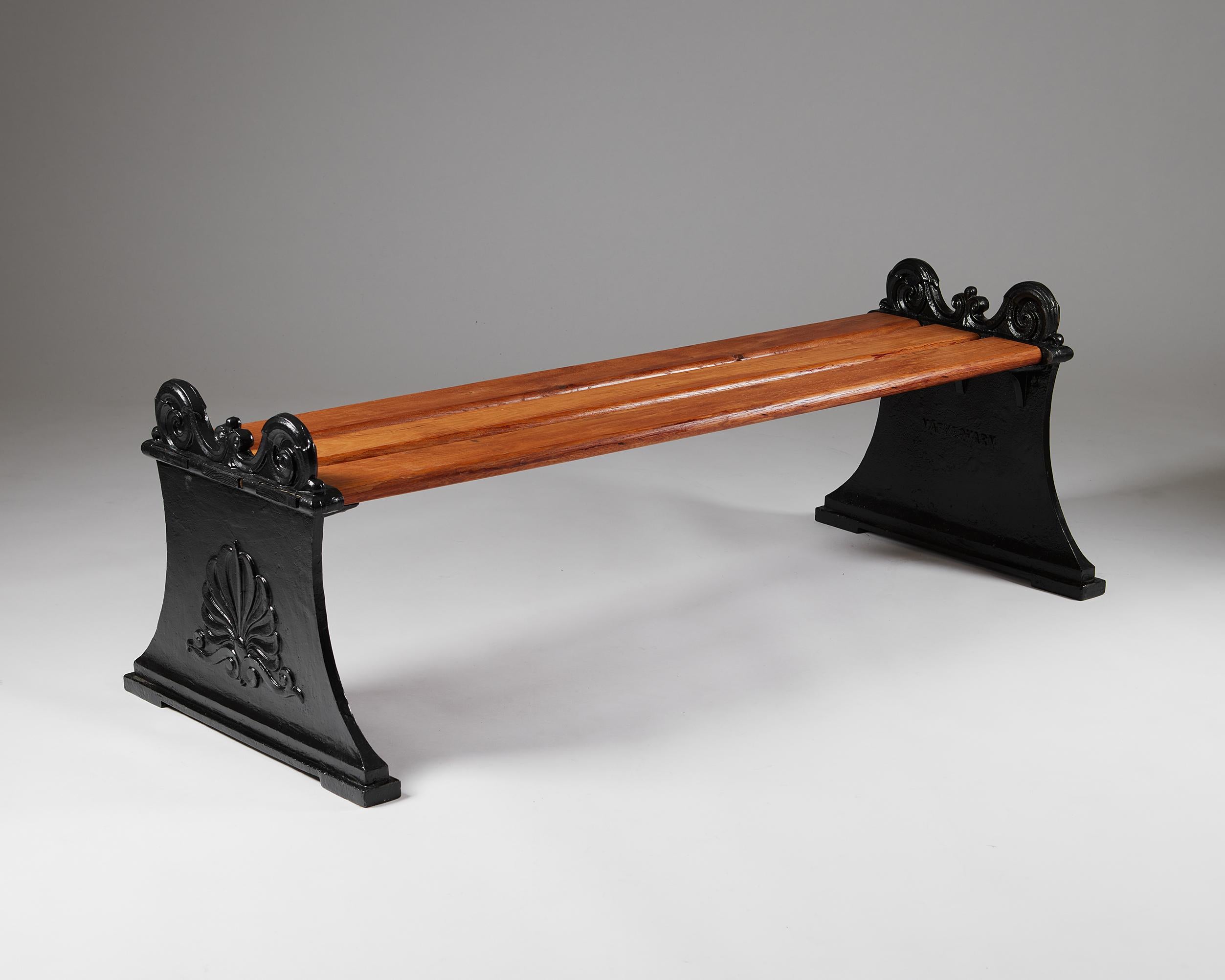 Bench with a pair of gables ‘Parkbänk No 1’ designed by Folke Bensow for Näfveqvarn,
Sweden, 1920.

Cast iron and stained wood.

Folke Bensow’s ‘Parkbänk No 1’ bench is both sturdy and elegant in appearance. The neoclassical cast iron gables are