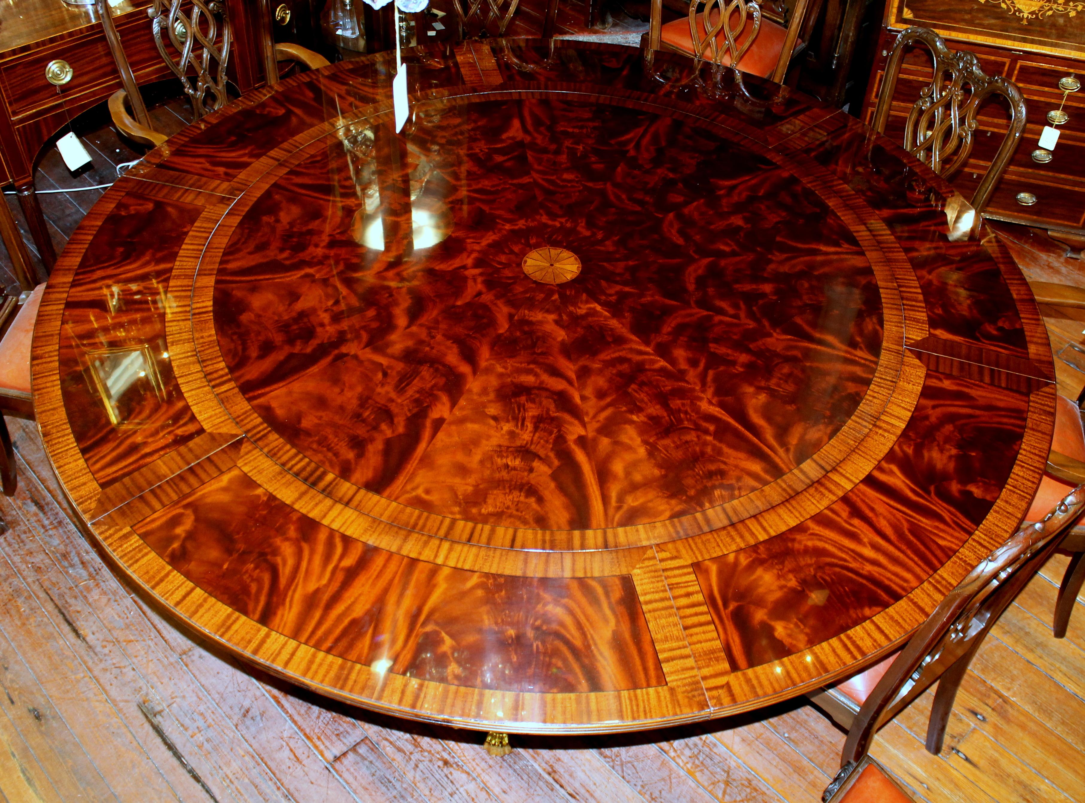 Contemporary Benchmade Bookmatched Flame Mahogany Perimeter Leaf Circular Dining Table