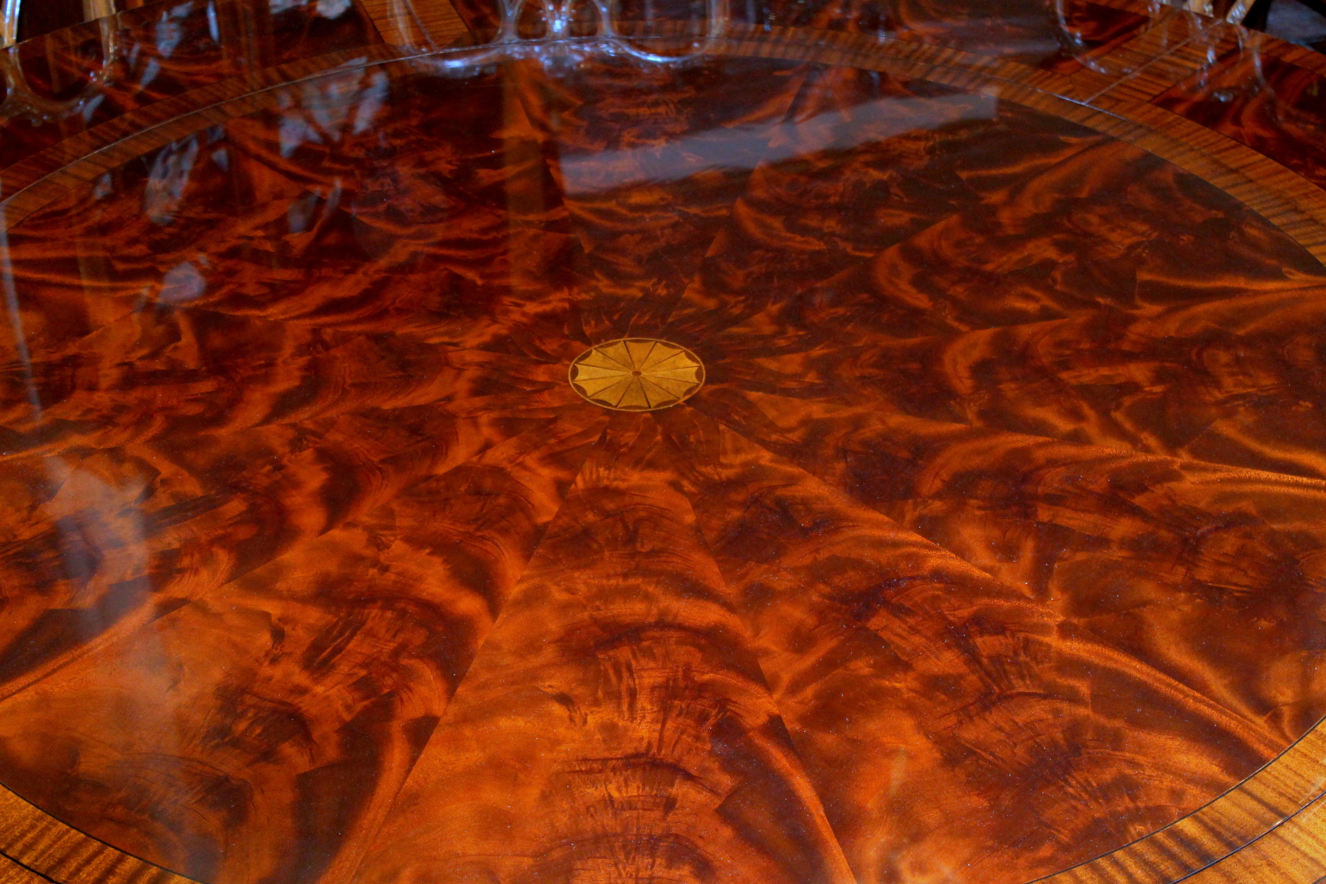 Benchmade Bookmatched Flame Mahogany Perimeter Leaf Circular Dining Table In New Condition For Sale In Charleston, SC