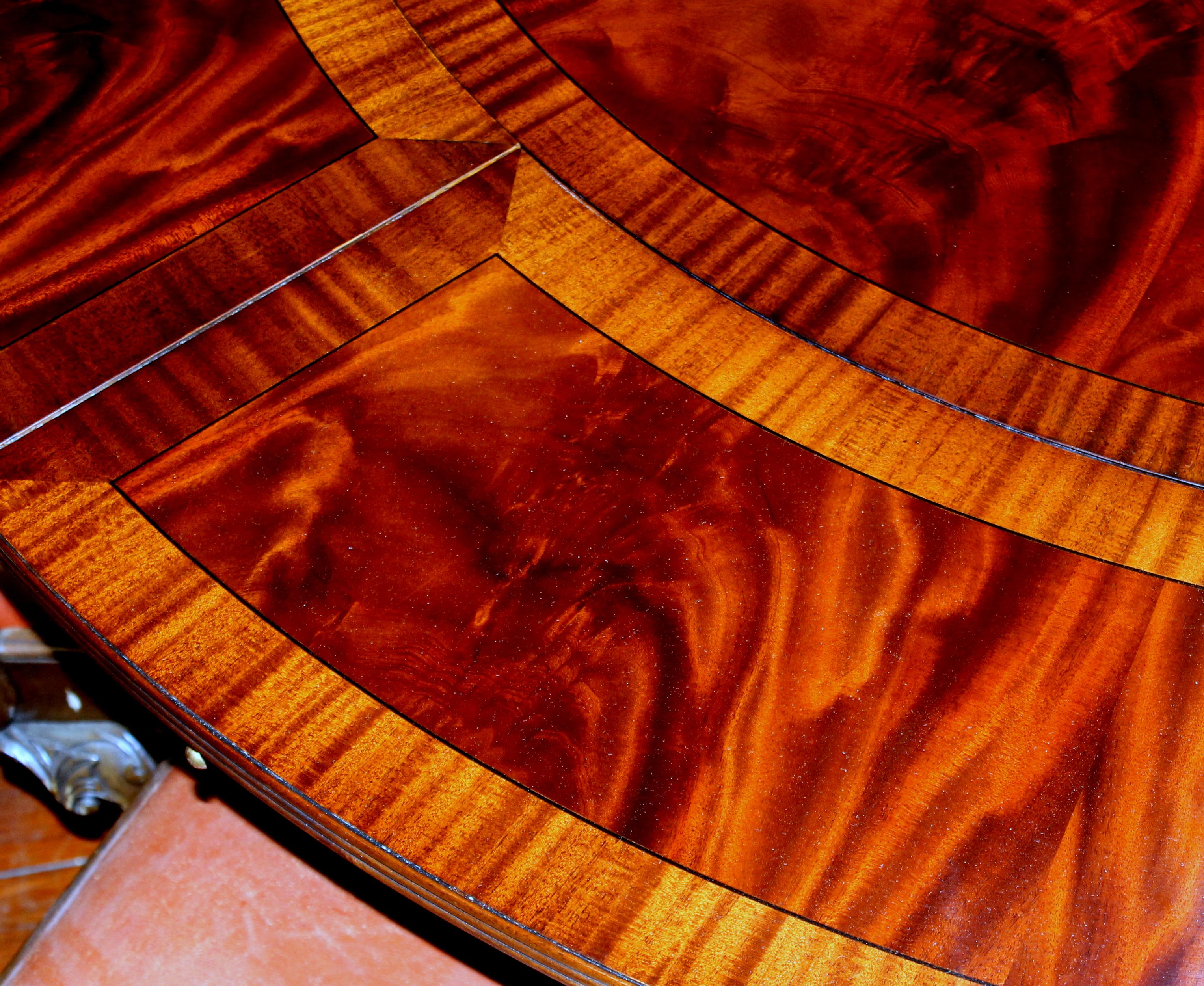 Benchmade Bookmatched Flame Mahogany Perimeter Leaf Circular Dining Table In Excellent Condition In CHARLESTON, SC