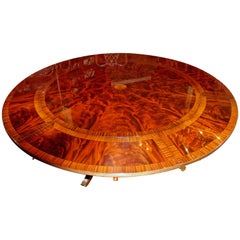 Benchmade Bookmatched Flame Mahogany Perimeter Leaf Circular Dining Table