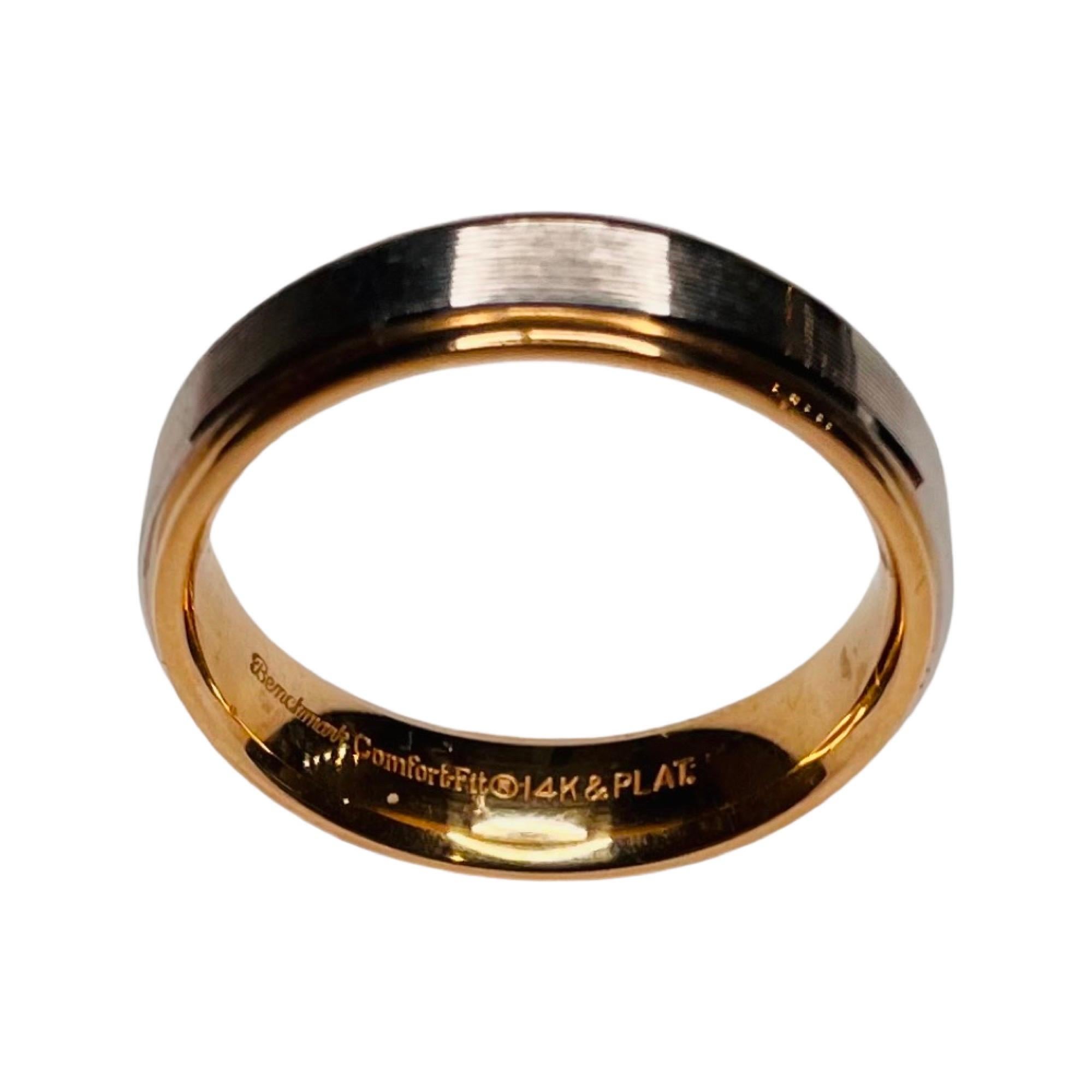 Benchmark 14K Yellow Gold and Platinum Wedding Band. This is a comfort fit band. It is 6.0 mm wide. It has etched platinum in the center with high polish on the outside of the band. It is finger size 10 but we can size it for an addition fee.