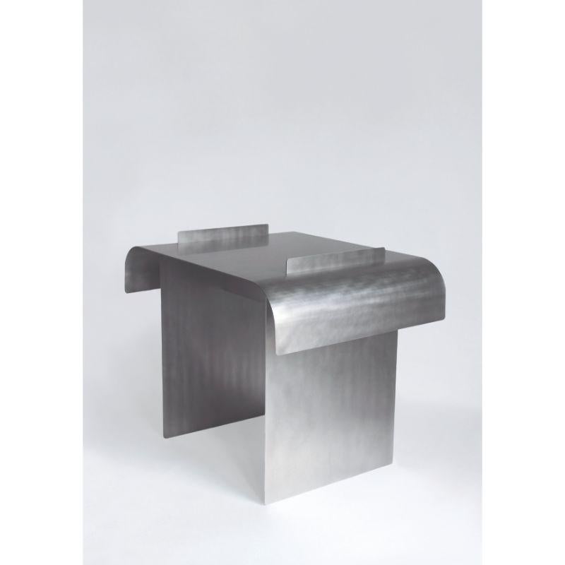 Bend table by Maria Tyakina
Edition: Numbered edition
Dimensions: L 58 x W 43 x H 43 cm
Materials: Stainless steel, hand-brushed

Also available: Bend table low

Navigating between art and design, Maria's work focuses on the relationship