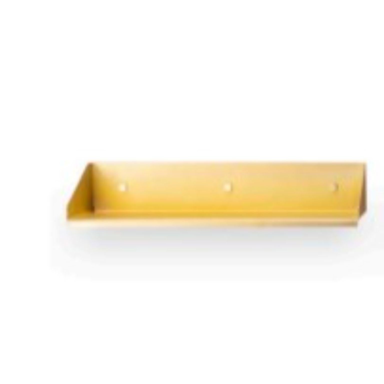 Bendy small shelf by Mingardo
Dimensions: D55 x W25 x H10 cm 
Materials: Matt brass plated stainless steel
Weight: 5 kg

Also Available in different finishes and dimensions.

Bendy is a shelf made of a single stainless steel foil, folded and