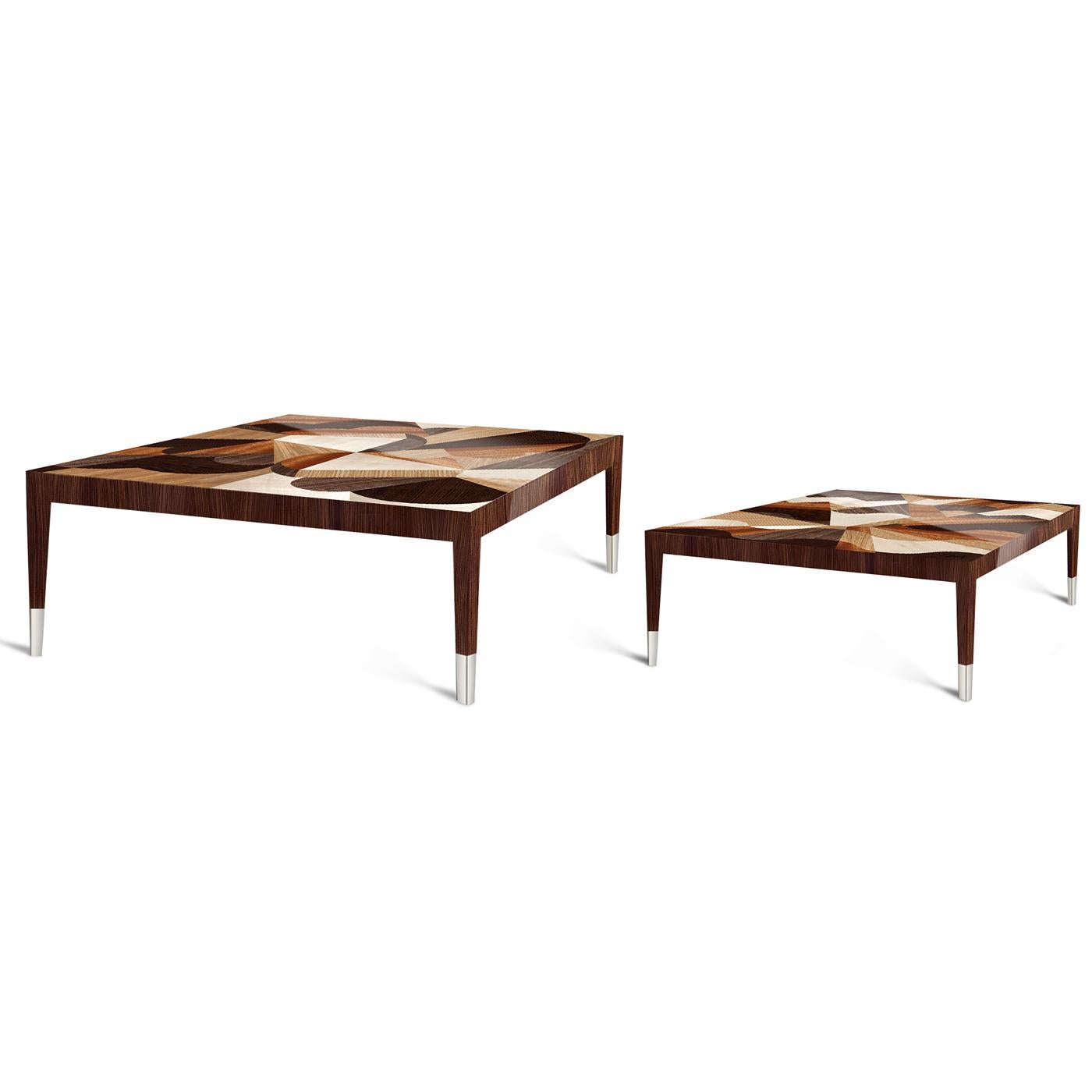 Part of the Classica collection, this coffee table is characterized by a top with an abstract, three-dimensional design made of wood inlays inspired by the personal, inner conflict between happy thoughts and gloomy doubts in a relationship. The