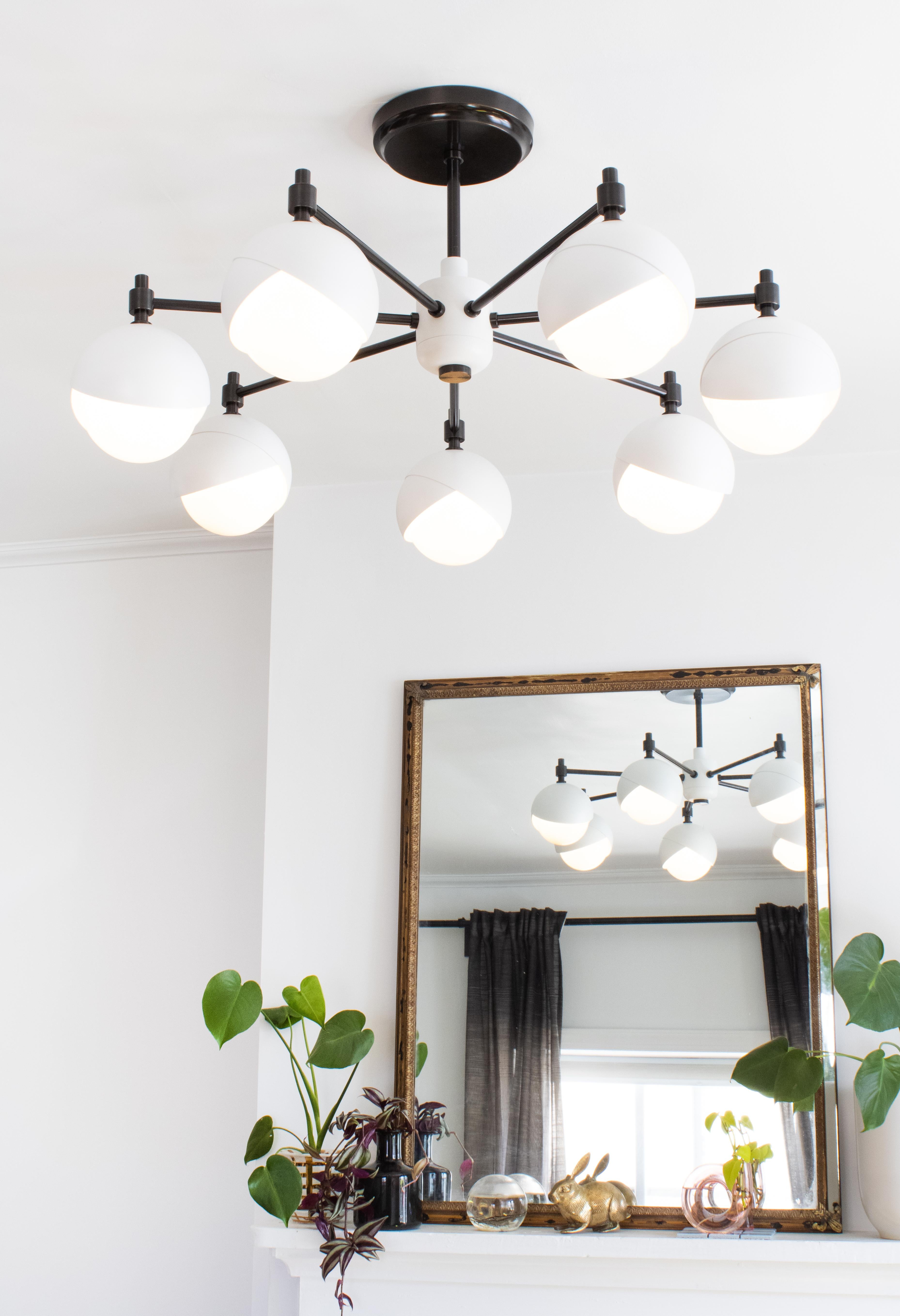 American Benedict Seven Light Chandelier in Matte White Powder Coat and Blackened Brass For Sale