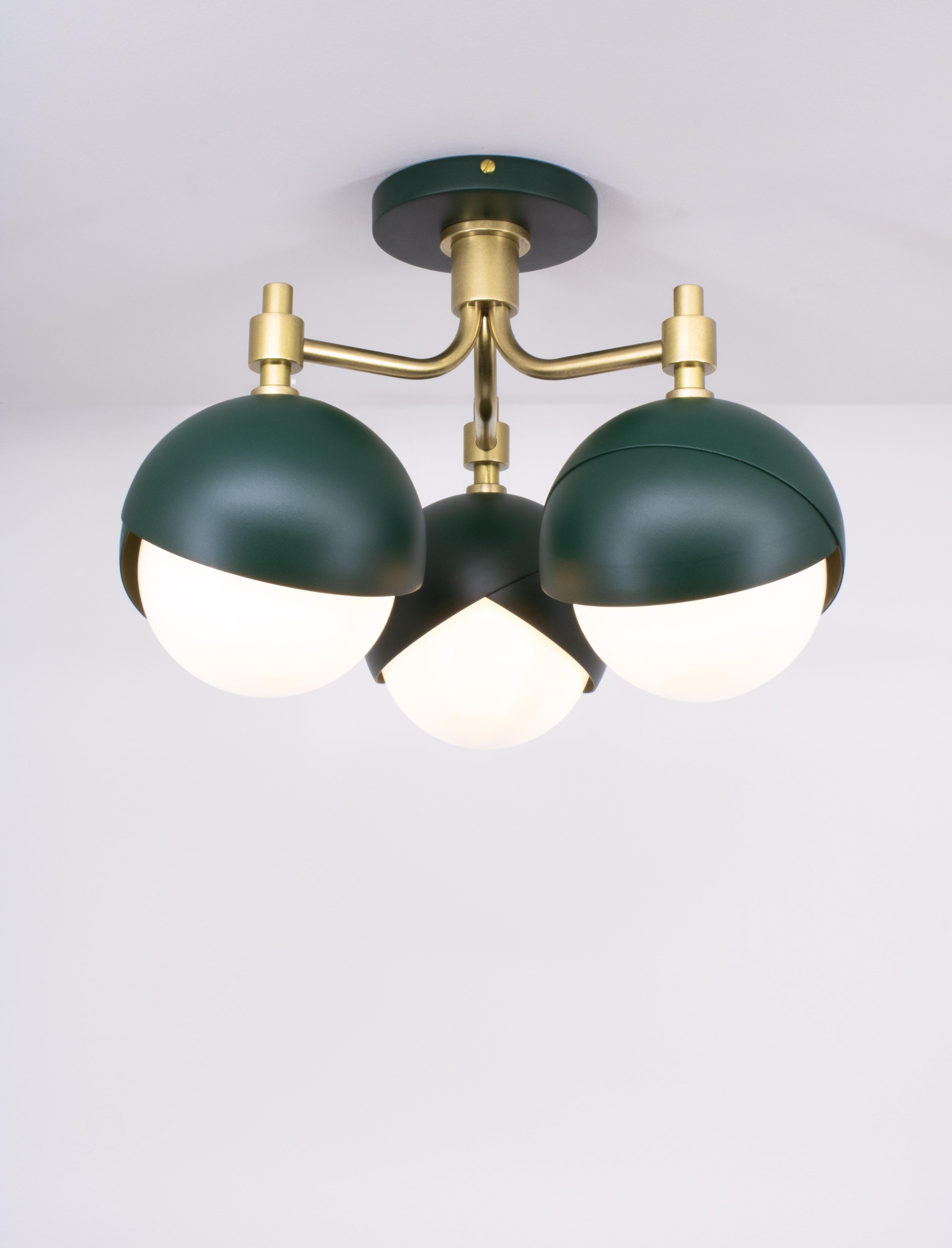 The Benedict™ three light lantern arranges three 6 inch Benedict™ light assemblies in a condensed bloom perfect for entry ways, stair wells, and other transitional spaces. Shown here in Matte Green powder coat and burnished brass. 

LAMPING:
Provide