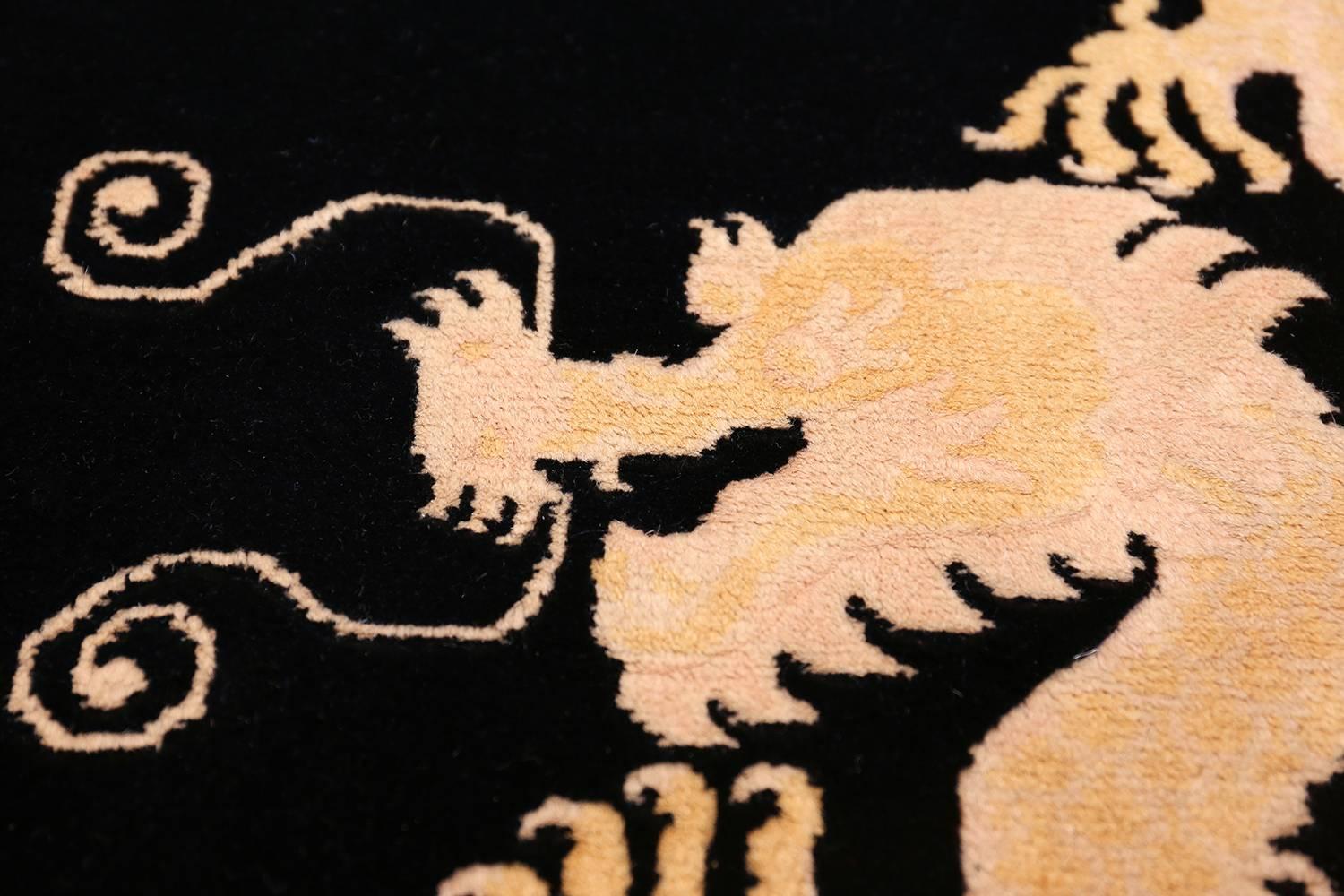 Chinese Export Benevolent Five Clawed Dragon Design Black Antique Chinese Rug. Size: 7' x 9' 6