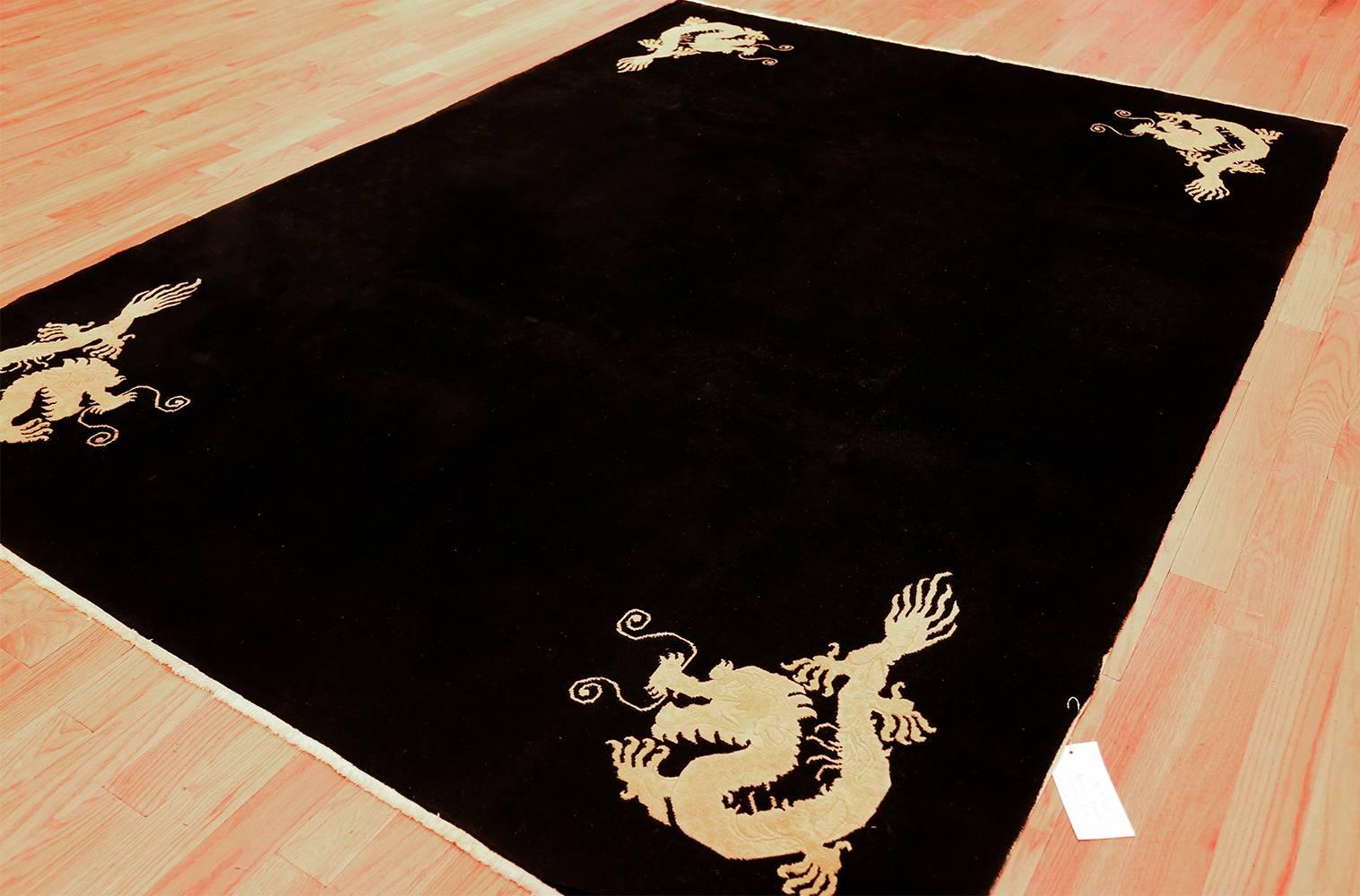 Wool Benevolent Five Clawed Dragon Design Black Antique Chinese Rug. Size: 7' x 9' 6